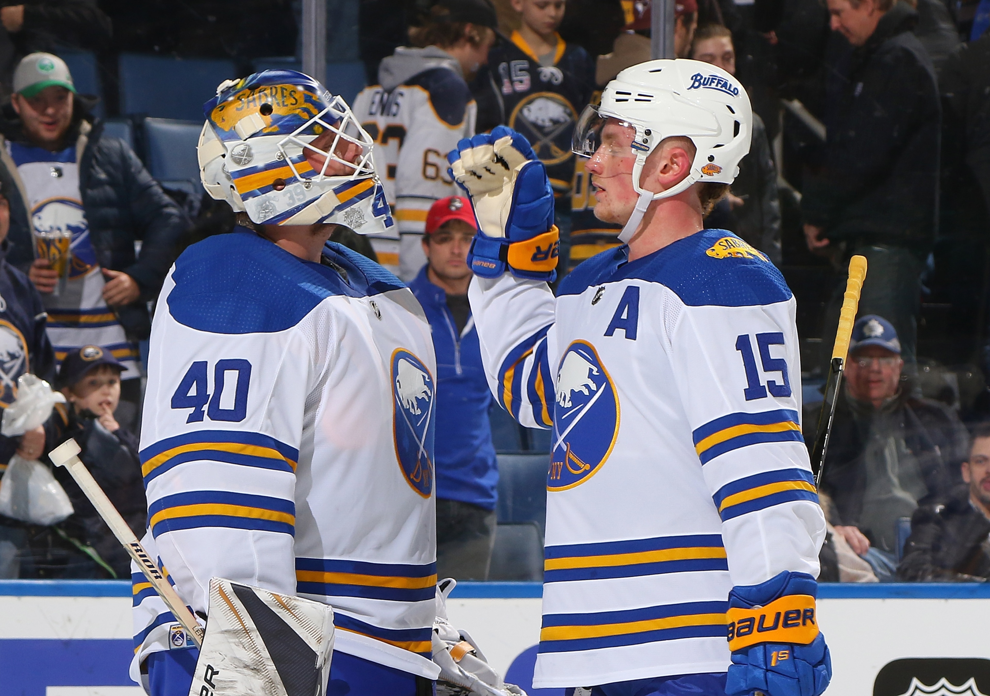 BUFFALO, NY - FEBRUARY 8: Robin Lehner #40 and Jack Eichel #15 of the Buffalo Sabres celebrate their 4-3 victory against the New York Islanders during an NHL game on February 8, 2018 at KeyBank Center in Buffalo, New York. (Photo by Rob Marczynski/NHLI via Getty Images) 