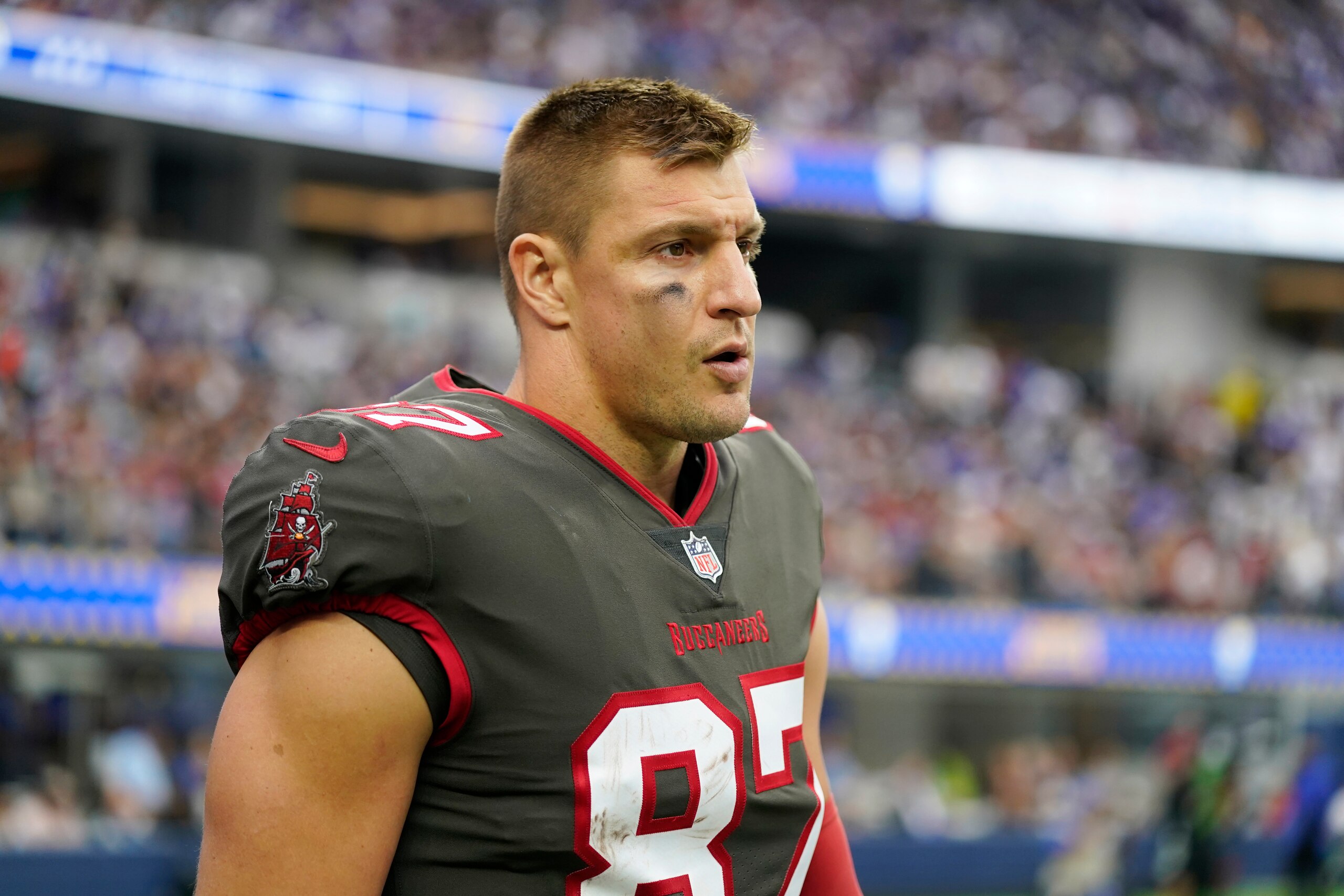 Tampa Bay Buccaneers tight end Rob Gronkowski walks on the field during the second half of an NFL football game against the Los Angeles Rams Sunday, Sept. 26, 2021, in Inglewood, Calif. (AP Photo/Jae C. Hong)