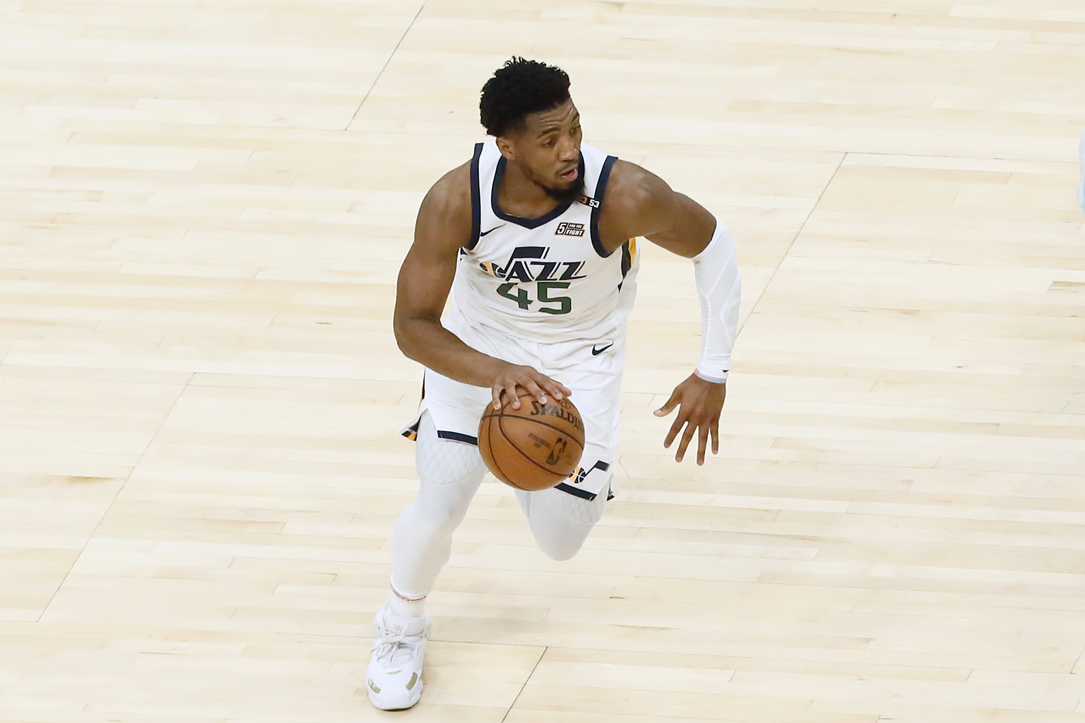 LOS ANGELES, CA - JUNE 18: Donovan Mitchell #45 of the Utah Jazz dribbles the ball during the game against the LA Clippers during Round 2, Game 6 of the 2021 NBA Playoffs on June 18, 2021 at STAPLES Center in Los Angeles, California. NOTE TO USER: User expressly acknowledges and agrees that, by downloading and/or using this Photograph, user is consenting to the terms and conditions of the Getty Images License Agreement. Mandatory Copyright Notice: Copyright 2021 NBAE (Photo by Chris Elise/NBAE via Getty Images)