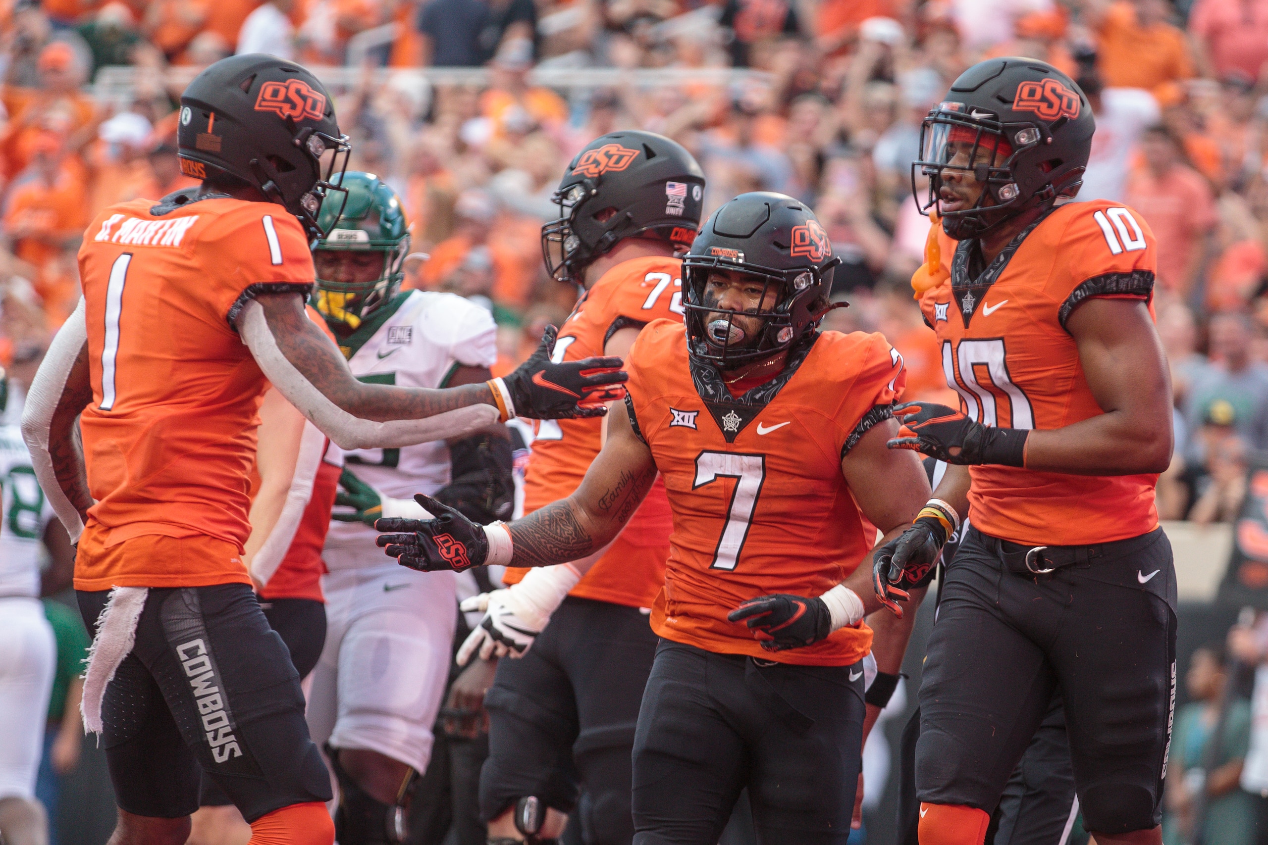 STILLWATER, OK - OCTOBER 02: Oklahoma State Cowboys running back Jaylen Warren (7) celebrates in the end zone after scoring against the Baylor Bears on October 2, 2021 at Boone Pickens Stadium in Stillwater, Oklahoma. (Photo by William Purnell/Icon Sportswire via Getty Images)