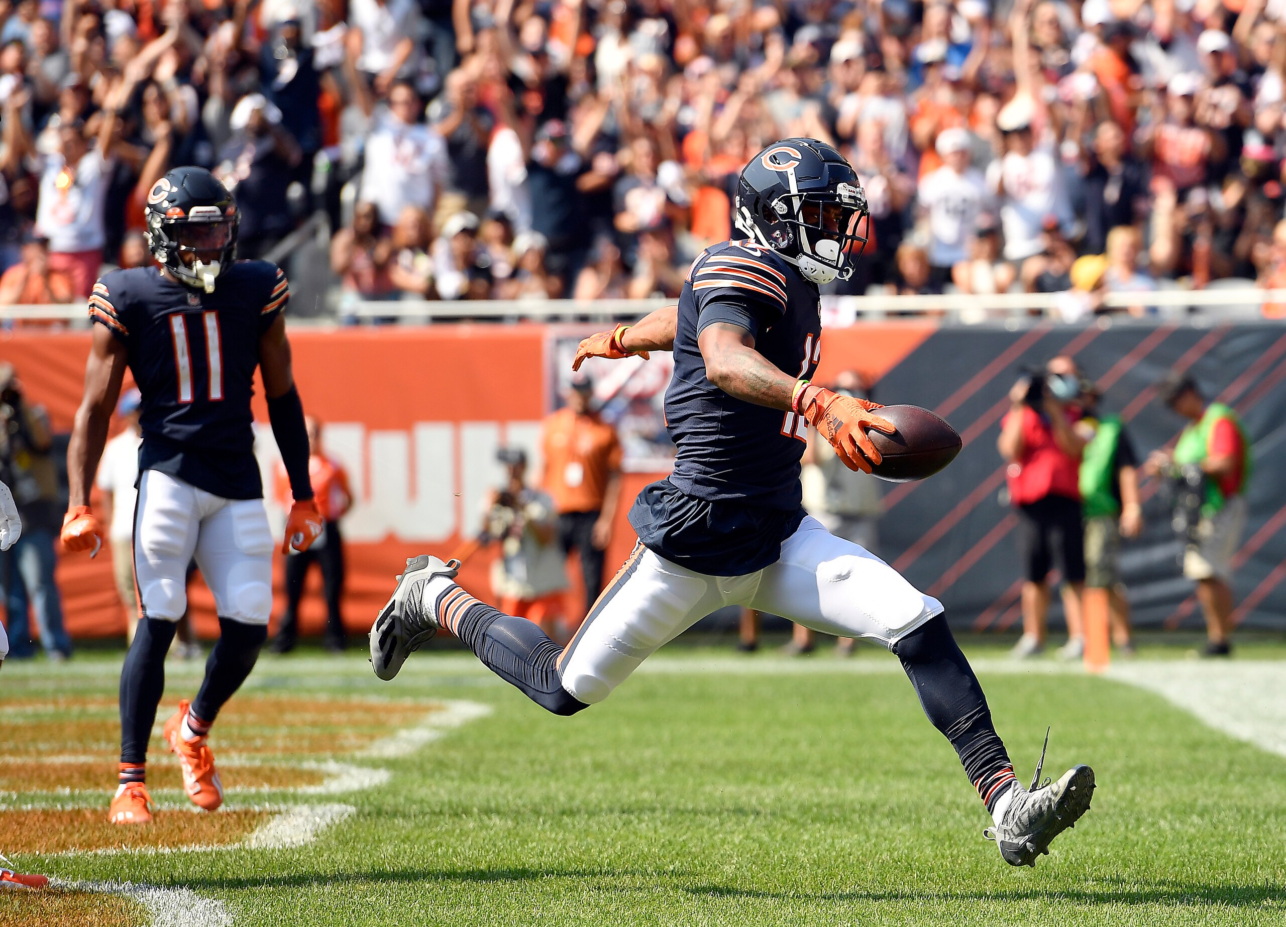 CHICAGO, ILLINOIS - SEPTEMBER 19: Wide receiver Allen Robinson #12 of the Chicago Bears catches the ball for a touchdown during the first quarter in the game  against Cincinnati Bengals at Soldier Field on September 19, 2021 in Chicago, Illinois. (Photo by Quinn Harris/Getty Images)