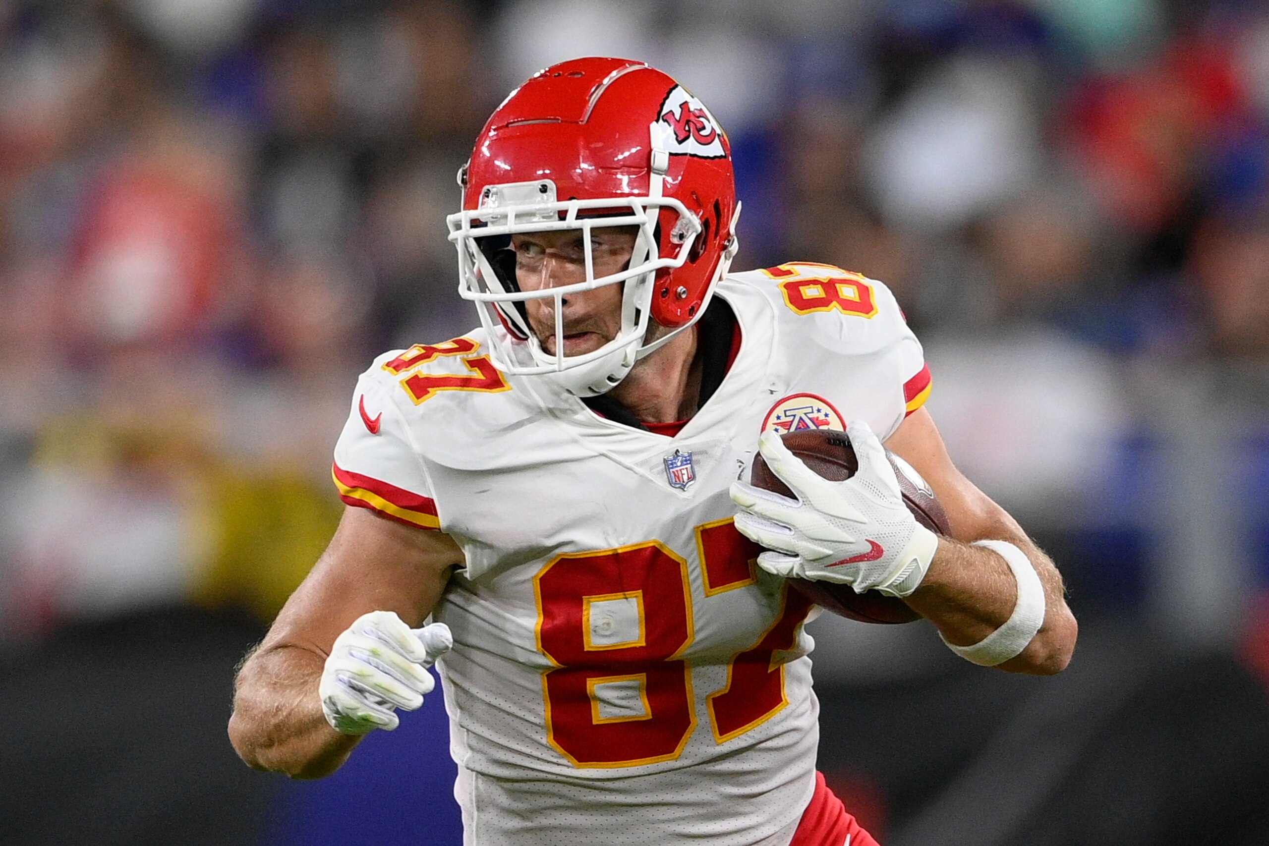 Kansas City Chiefs tight end Travis Kelce rushes the ball in the first half of an NFL football game against the Baltimore Ravens, Sunday, Sept. 19, 2021, in Baltimore. (AP Photo/Nick Wass)