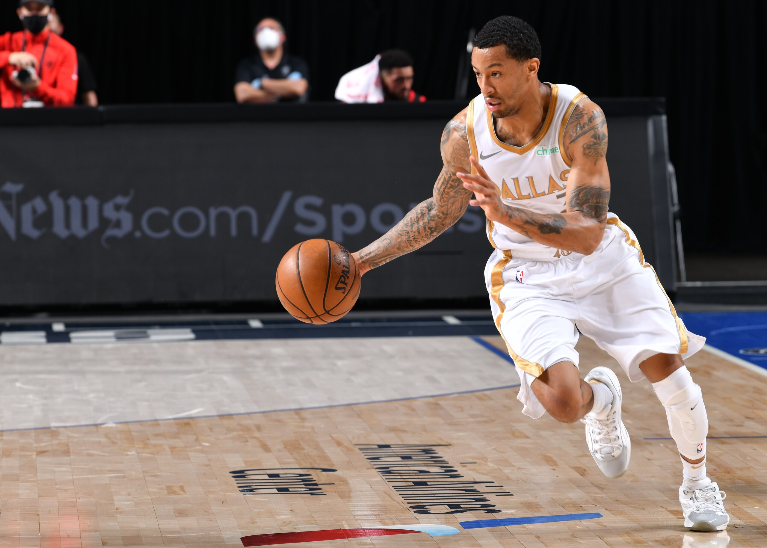 DALLAS, TX - MAY 14: Trey Burke #3 of the Dallas Mavericks dribbles during the game against the Toronto Raptors on May 14, 2021 at the American Airlines Center in Dallas, Texas. NOTE TO USER: User expressly acknowledges and agrees that, by downloading and or using this photograph, User is consenting to the terms and conditions of the Getty Images License Agreement. Mandatory Copyright Notice: Copyright 2021 NBAE (Photo by Glenn James/NBAE via Getty Images)