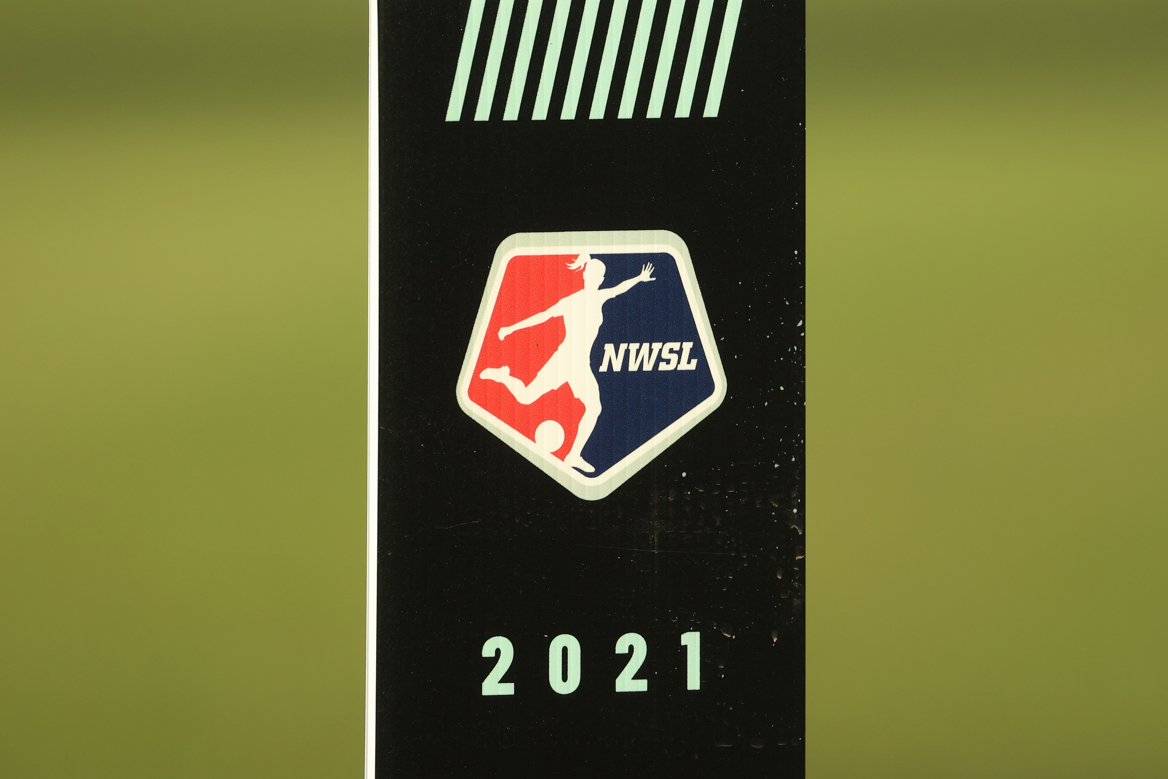 TACOMA, WASHINGTON - JUNE 22: A view of the NWSL logo pictured before a game between the OL Reign and Chicago Red Stars at Cheney Stadium on June 22, 2021 in Tacoma, Washington. (Photo by Abbie Parr/Getty Images) TACOMA, WASHINGTON - JUNE 22: A view of the NWSL logo pictured before a game between the OL Reign and Chicago Red Stars at Cheney Stadium on June 22, 2021 in Tacoma, Washington. (Photo by Abbie Parr/Getty Images)