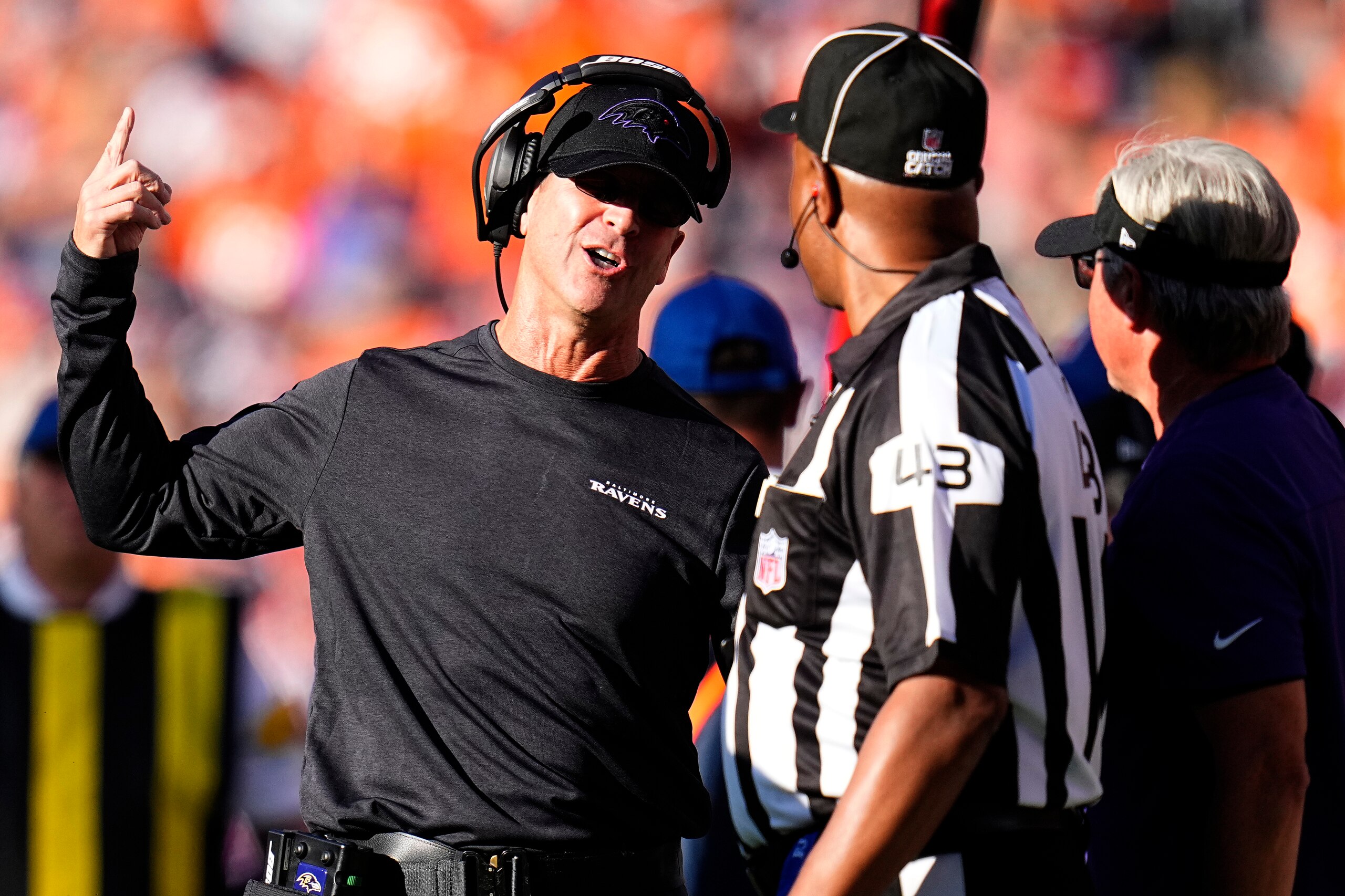 Baltimore Ravens head coach John Harbaugh argues a call with the referee during the second half of an NFL football game against the Denver Broncos, Sunday, Oct. 3, 2021, in Denver. (AP Photo/Jack Dempsey)