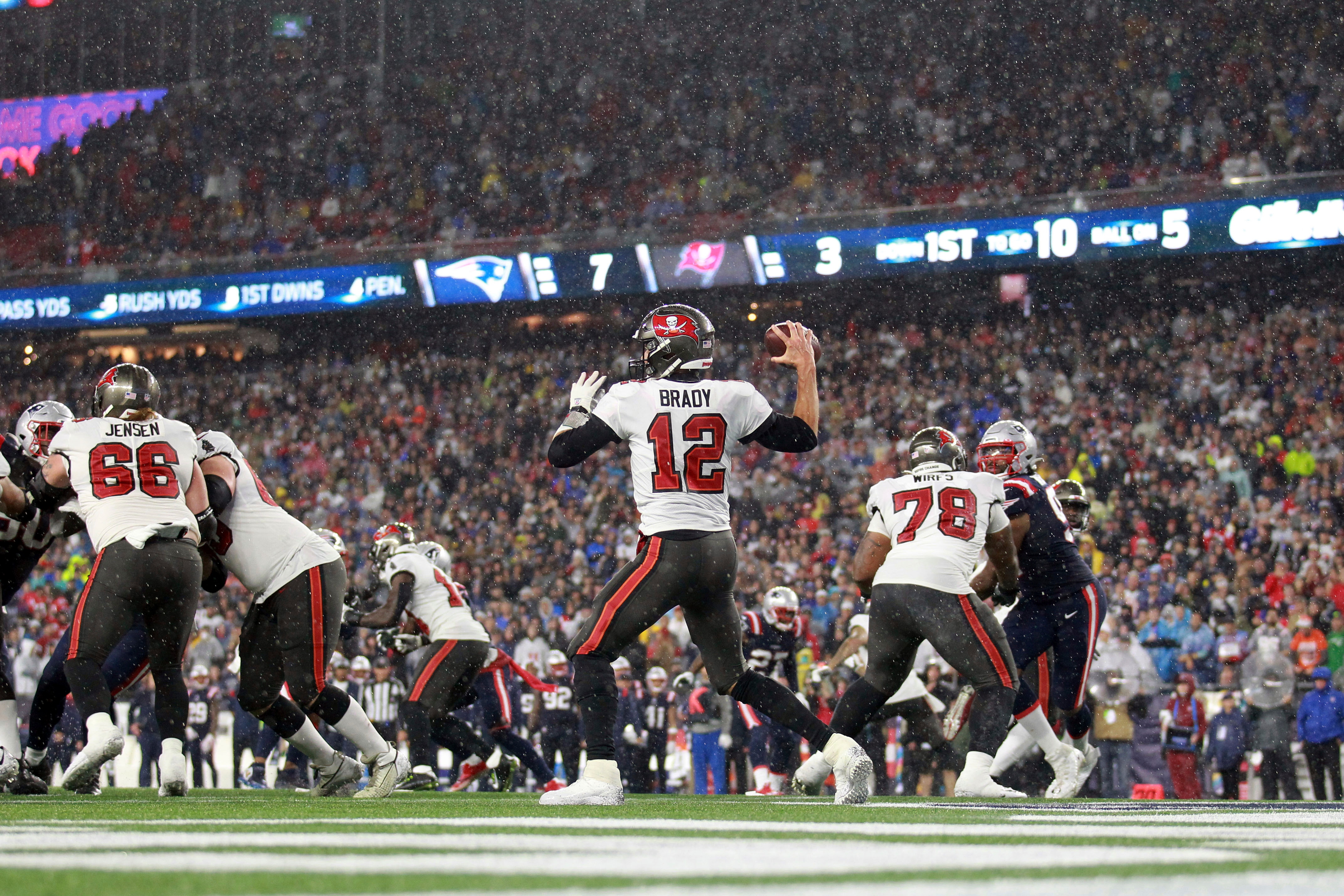 Tampa Bay Buccaneers quarterback Tom Brady (12) throws a pass during the first half of an NFL football game New England Patriots, Sunday, Oct. 3, 2021, in Foxborough, Mass. (AP Photo/Stew Milne)