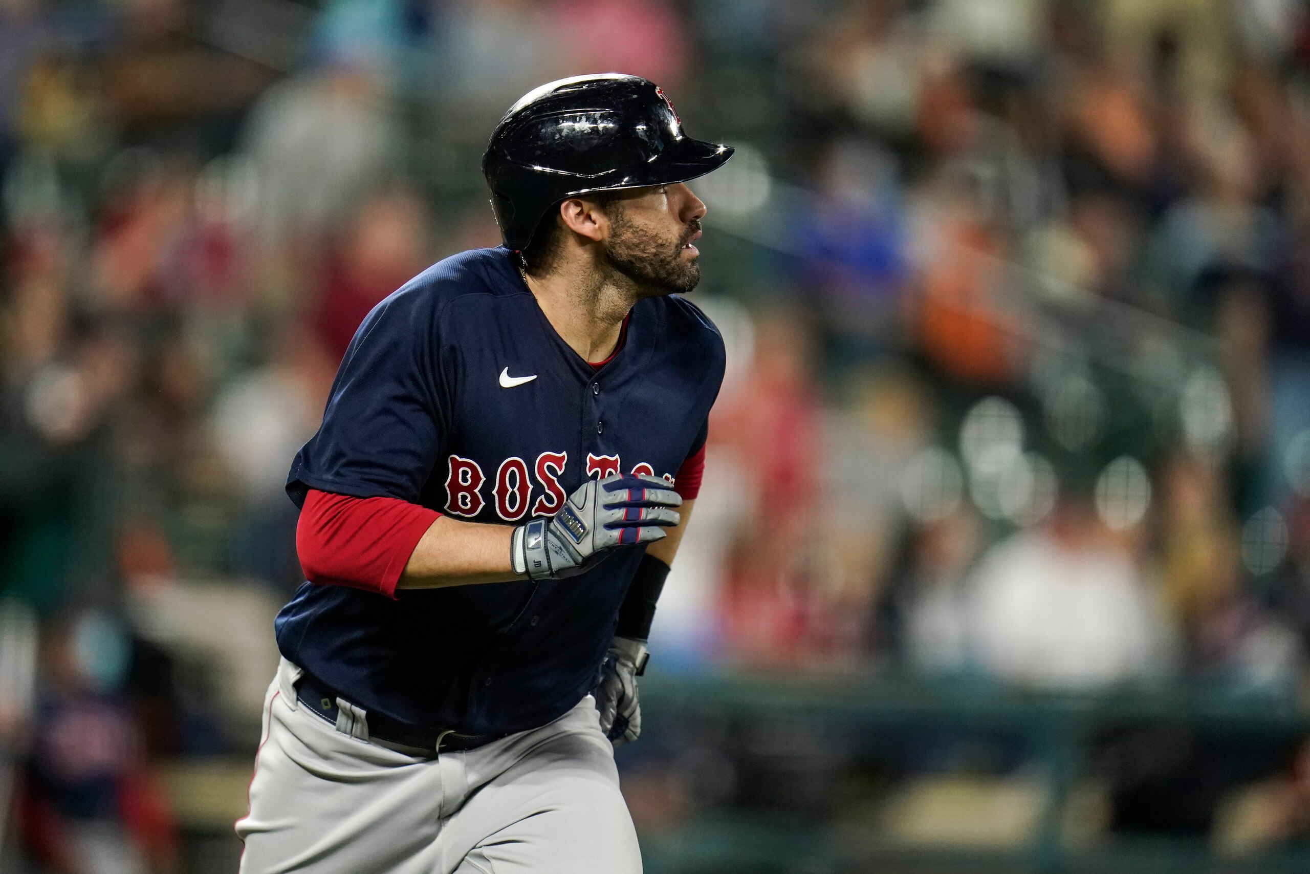 Boston Red Sox designated hitter J.D. Martinez watches his ball as he hits a solo home run off Baltimore Orioles starting pitcher Zac Lowther during the second inning of a baseball game, Wednesday, Sept. 29, 2021, in Baltimore. (AP Photo/Julio Cortez) Boston Red Sox designated hitter J.D. Martinez watches his ball as he hits a solo home run off Baltimore Orioles starting pitcher Zac Lowther during the second inning of a baseball game, Wednesday, Sept. 29, 2021, in Baltimore. (AP Photo/Julio Cortez)