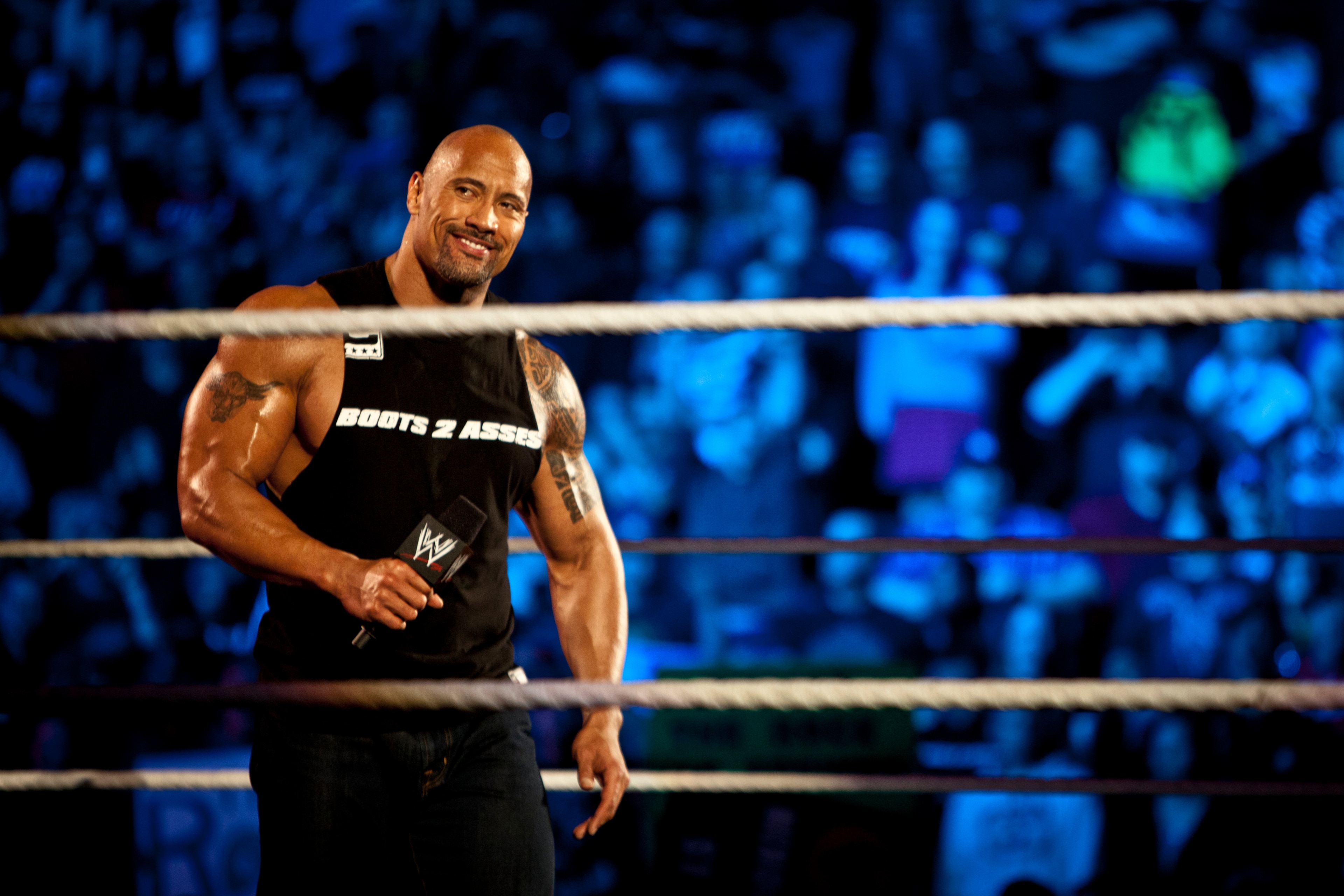 Dwayne Johnson, aka The Rock, enters the ring to talk smack about his upcoming opponent John Cena during the WWE Raw event at Rose Garden arena in Portland, Ore., Monday February 27th, 2012. (Photo by Chris Ryan/Corbis via Getty Images) Dwayne Johnson, aka The Rock, enters the ring to talk smack about his upcoming opponent John Cena during the WWE Raw event at Rose Garden arena in Portland, Ore., Monday February 27th, 2012. (Photo by Chris Ryan/Corbis via Getty Images)