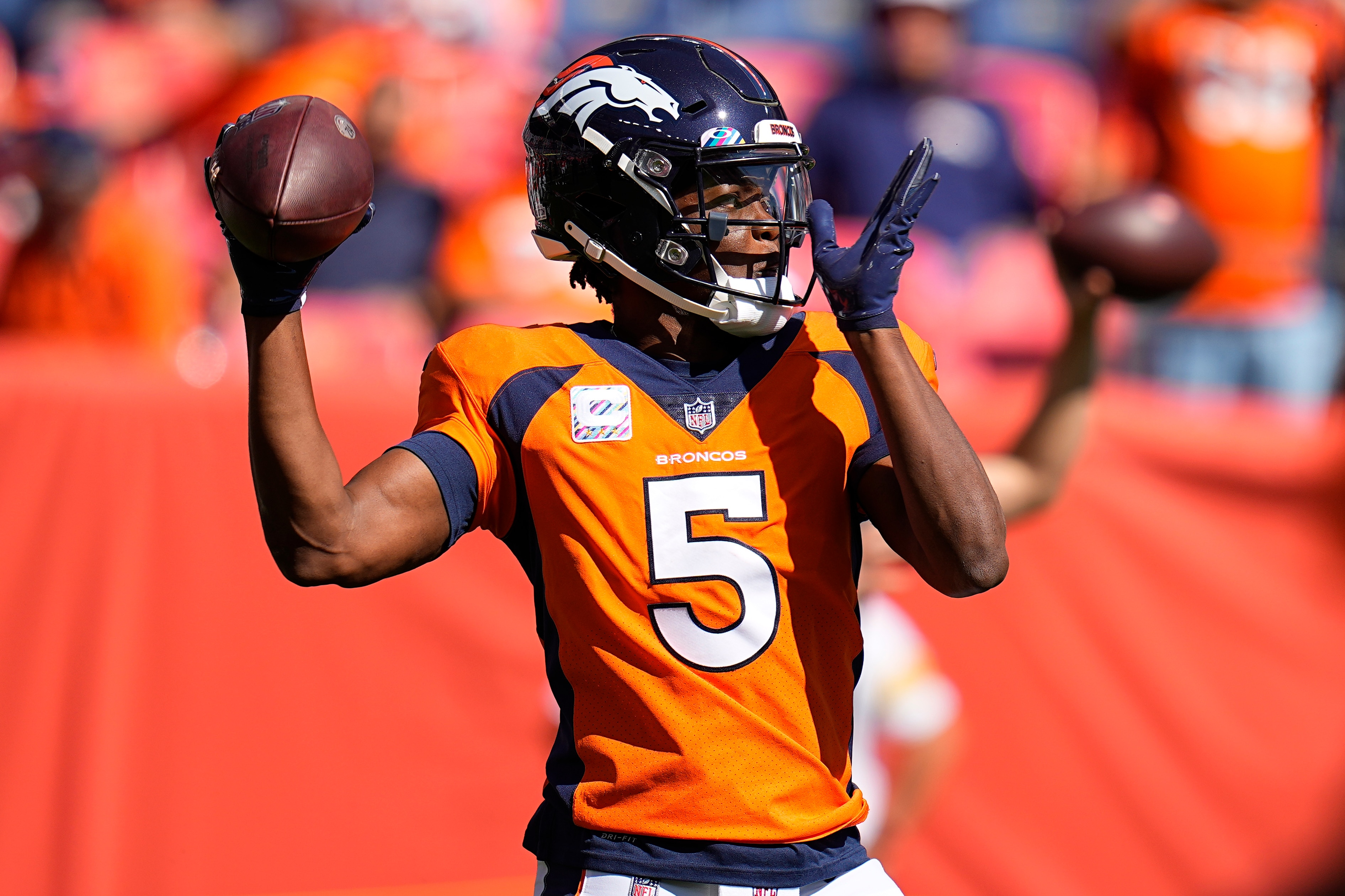 Denver Broncos quarterback Teddy Bridgewater (5) warms up prior to an NFL football game against the Baltimore Ravens, Sunday, Oct. 3, 2021, in Denver. (AP Photo/Jack Dempsey)