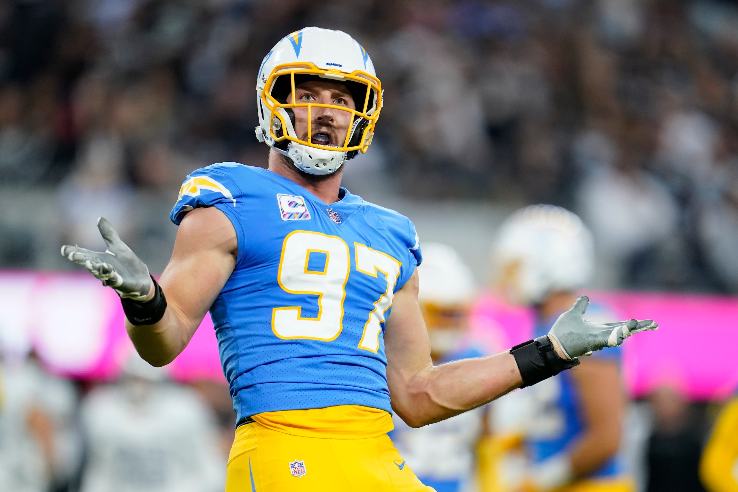 Los Angeles Chargers defensive end Joey Bosa reacts after sacking Las Vegas Raiders quarterback Derek Carr during the first half of an NFL football game Monday, Oct. 4, 2021, in Inglewood, Calif. (AP Photo/Marcio Jose Sanchez) Los Angeles Chargers defensive end Joey Bosa reacts after sacking Las Vegas Raiders quarterback Derek Carr during the first half of an NFL football game Monday, Oct. 4, 2021, in Inglewood, Calif. (AP Photo/Marcio Jose Sanchez)