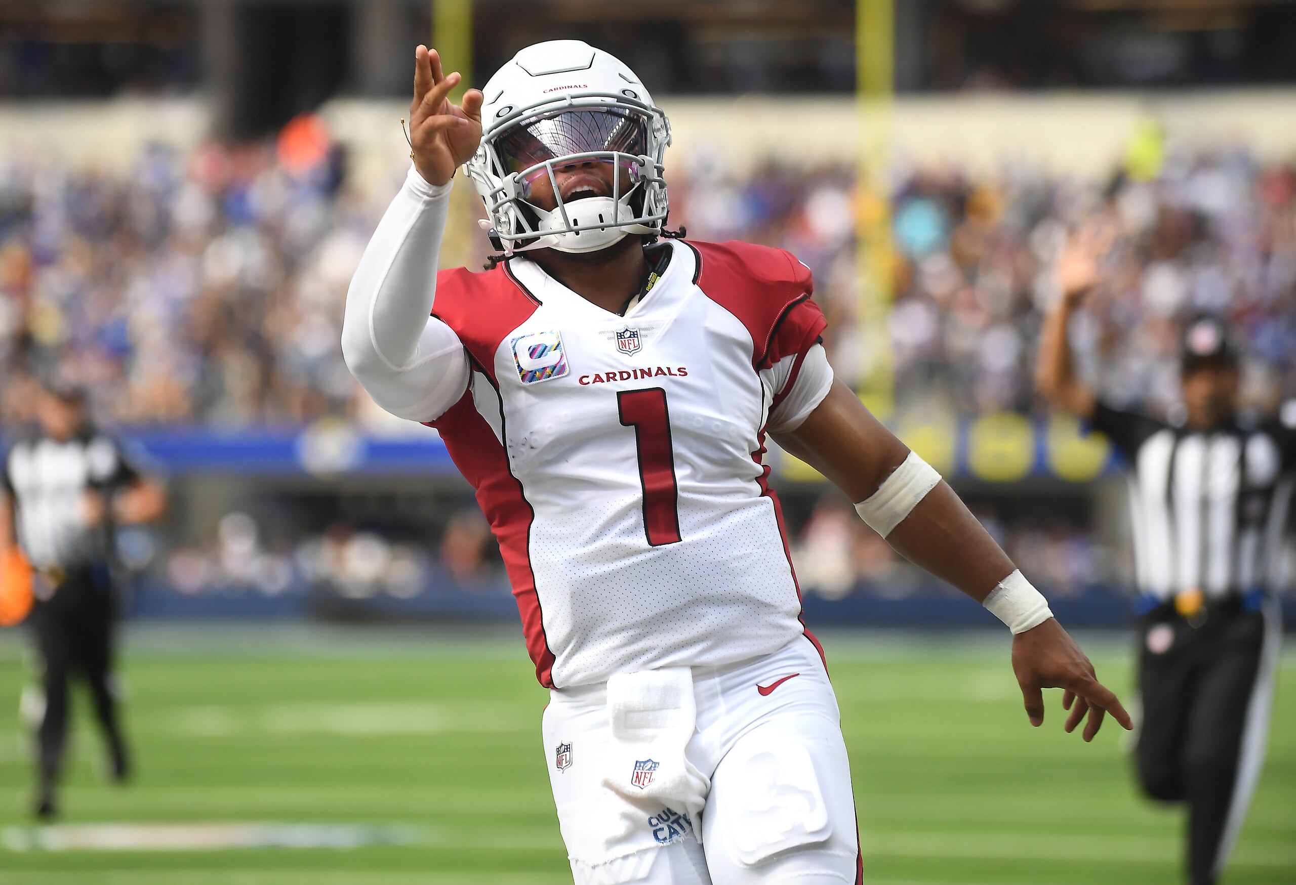 Inglewood, CA. October 3, 2021: Cardinals quarterback Kyler Murray celebrates his first down run against the Rams in the second quarter at SoFi Stadium Sunday. (Wally Skalij/Los Angeles Times via Getty Images)