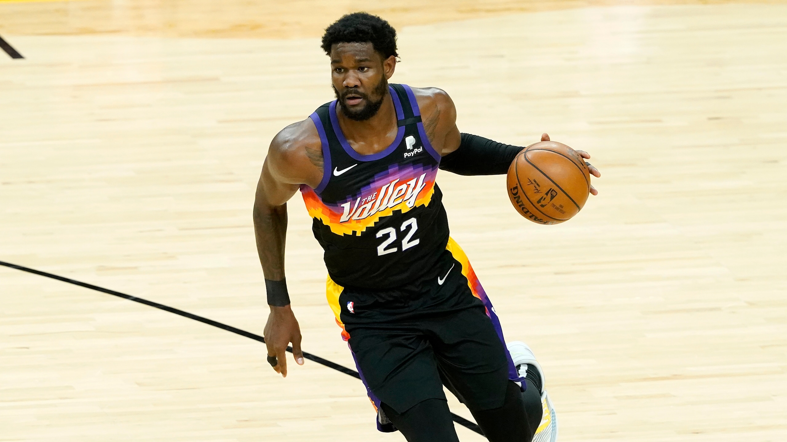Phoenix Suns center Deandre Ayton (22) against the Denver Nuggets during the second half of Game 2 of an NBA basketball second-round playoff series, Wednesday, June 9, 2021, in Phoenix. (AP Photo/Matt York)
