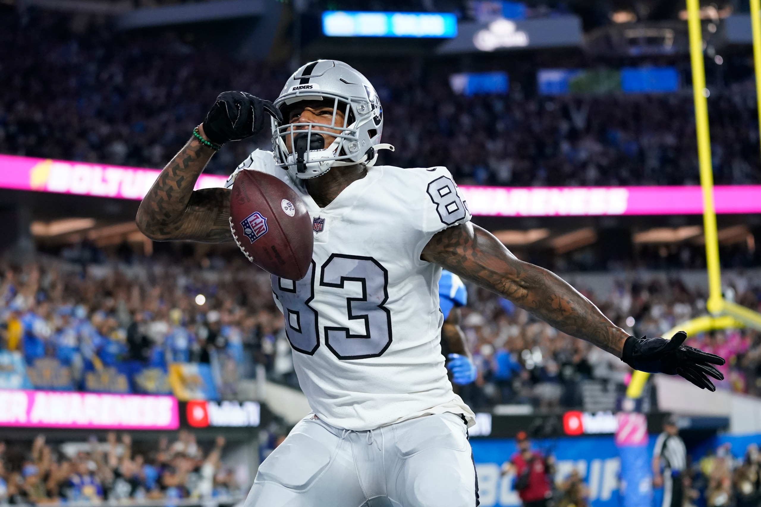 Las Vegas Raiders tight end Darren Waller reacts after scoring a touchdown during the second half of an NFL football game against the Los Angeles Chargers, Monday, Oct. 4, 2021, in Inglewood, Calif. (AP Photo/Ashley Landis)
