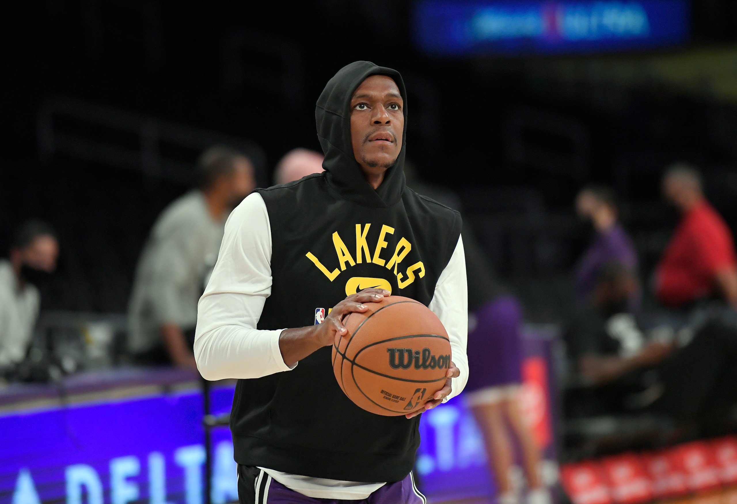 LOS ANGELES, CA - OCTOBER 03: Rajon Rondo #4 of the Los Angeles Lakers warms up before the start of a pre-season game against the Brooklyn Nets at Staples Center on October 3, 2021 in Los Angeles, California. NOTE TO USER: User expressly acknowledges and agrees that, by downloading and/or using this Photograph, user is consenting to the terms and conditions of the Getty Images License Agreement. (Photo by Kevork Djansezian/Getty Images)(Photo by Kevork Djansezian/Getty Images) LOS ANGELES, CA - OCTOBER 03: Rajon Rondo #4 of the Los Angeles Lakers warms up before the start of a pre-season game against the Brooklyn Nets at Staples Center on October 3, 2021 in Los Angeles, California. NOTE TO USER: User expressly acknowledges and agrees that, by downloading and/or using this Photograph, user is consenting to the terms and conditions of the Getty Images License Agreement. (Photo by Kevork Djansezian/Getty Images)(Photo by Kevork Djansezian/Getty Images)