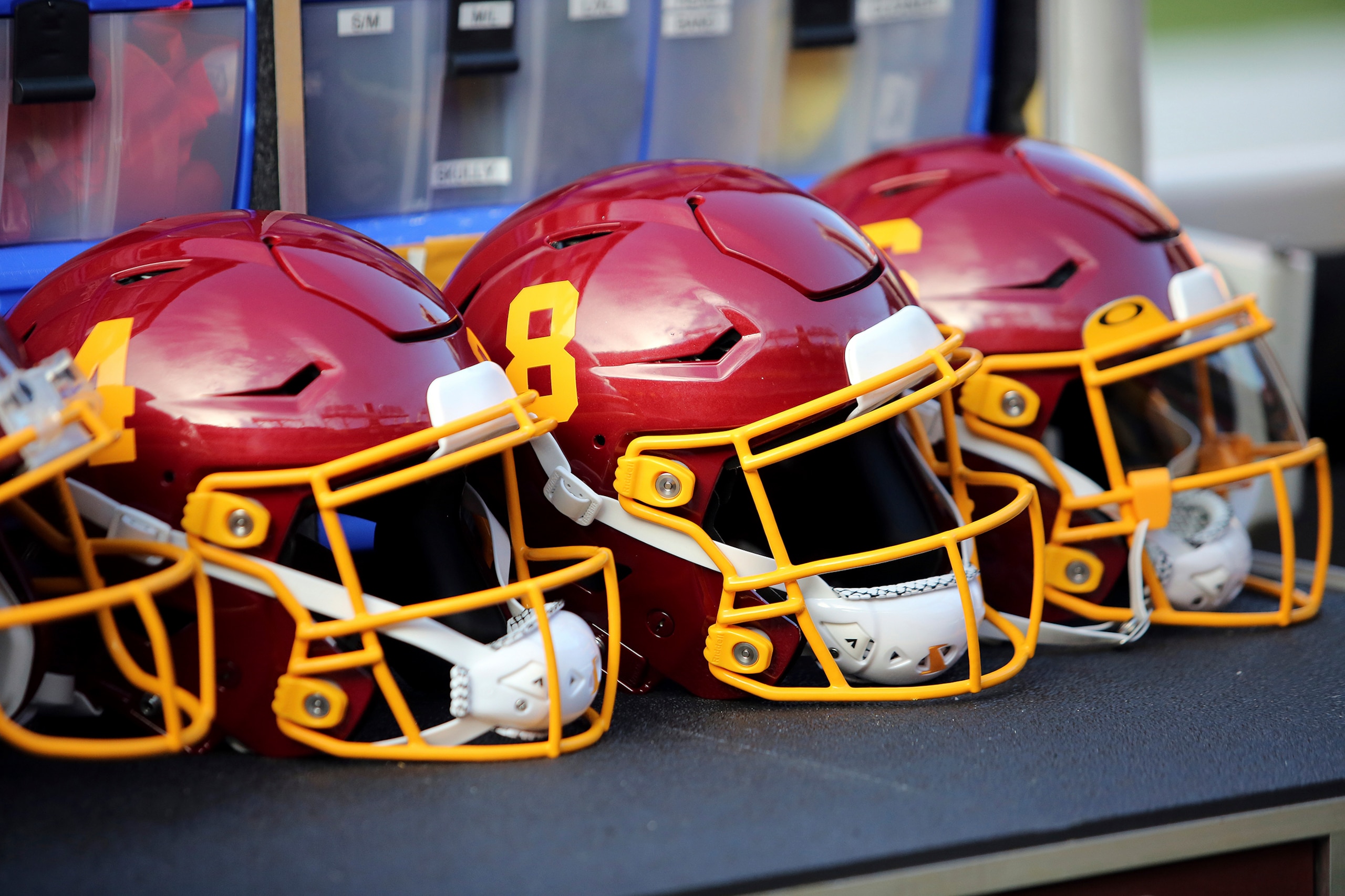 FILE - Washington Football Team helmets are shown before an NFL preseason football game against the Cincinnati Bengals in Landover, Md., in this Friday, Aug. 20, 2021, file photo. The NFL Players Association says it has sent a formal request to the league for information about Washington's practice facility being searched last week by federal authorities. (AP Photo/Daniel Kucin Jr., File)