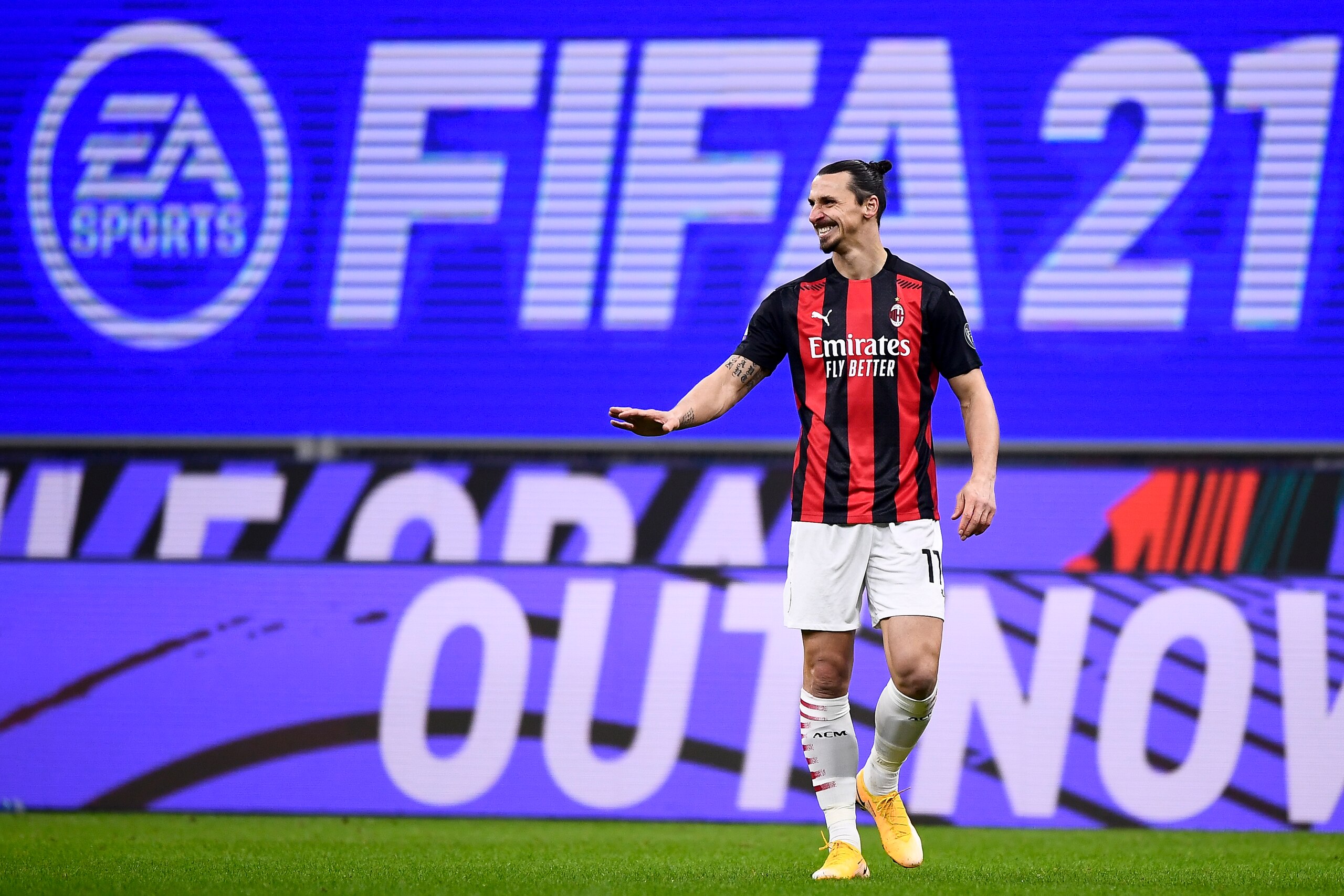 STADIO GIUSEPPE MEAZZA, MILAN, ITALY - 2021/01/09: Zlatan Ibrahimovic of AC Milan reacts in front of a EA Sports FIFA 21 video game  billboard advertising during the Serie A football match between AC Milan and Torino FC. AC Milan won 2-0 over Torino FC. (Photo by Nicolò Campo/LightRocket via Getty Images)