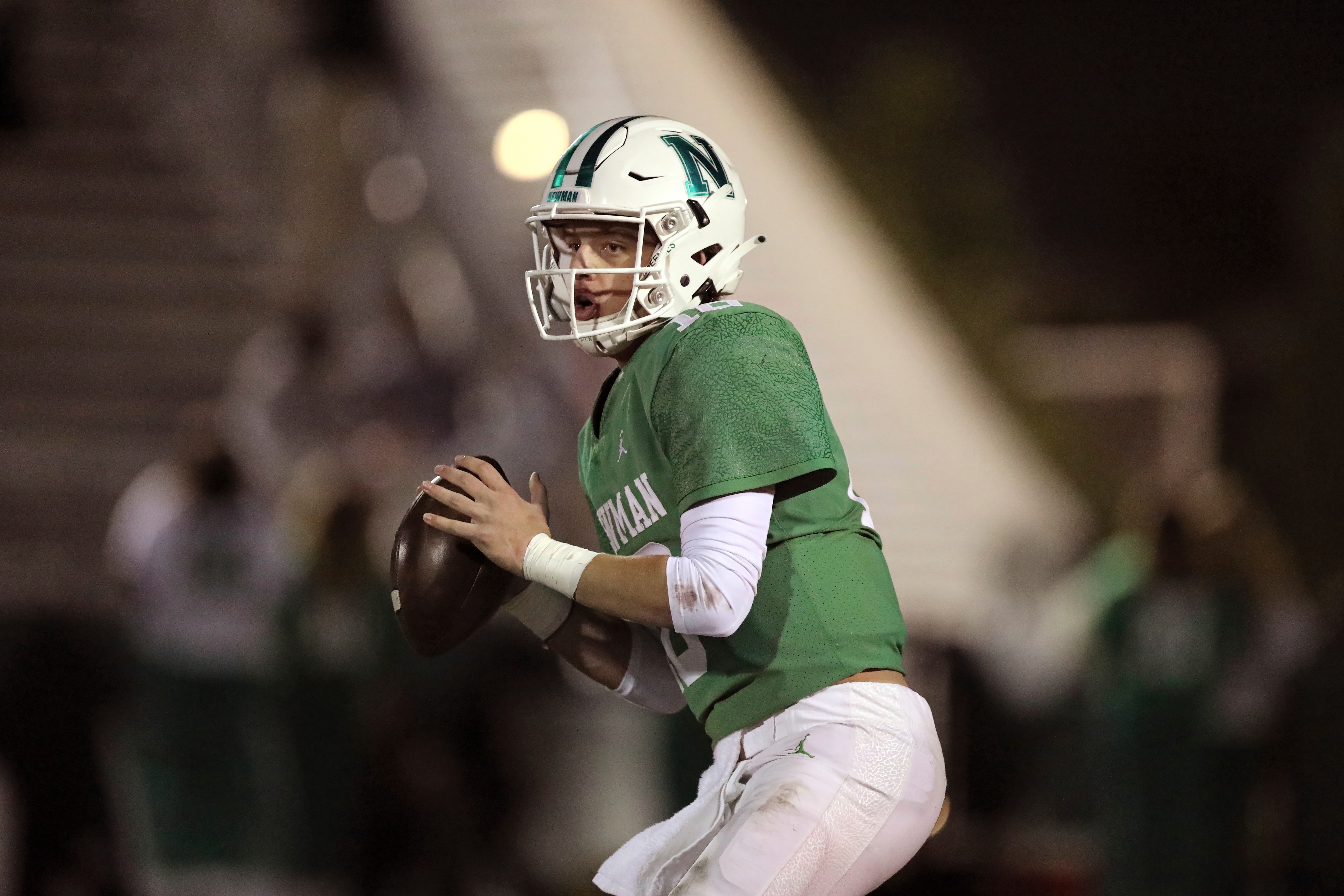 Newman High School quarterback Arch Manning (16) drops back to pass during a playoff game against Catholic High of New Iberia, in New Orleans, Friday, Dec. 4, 2020. (AP Photo/Ted Jackson)