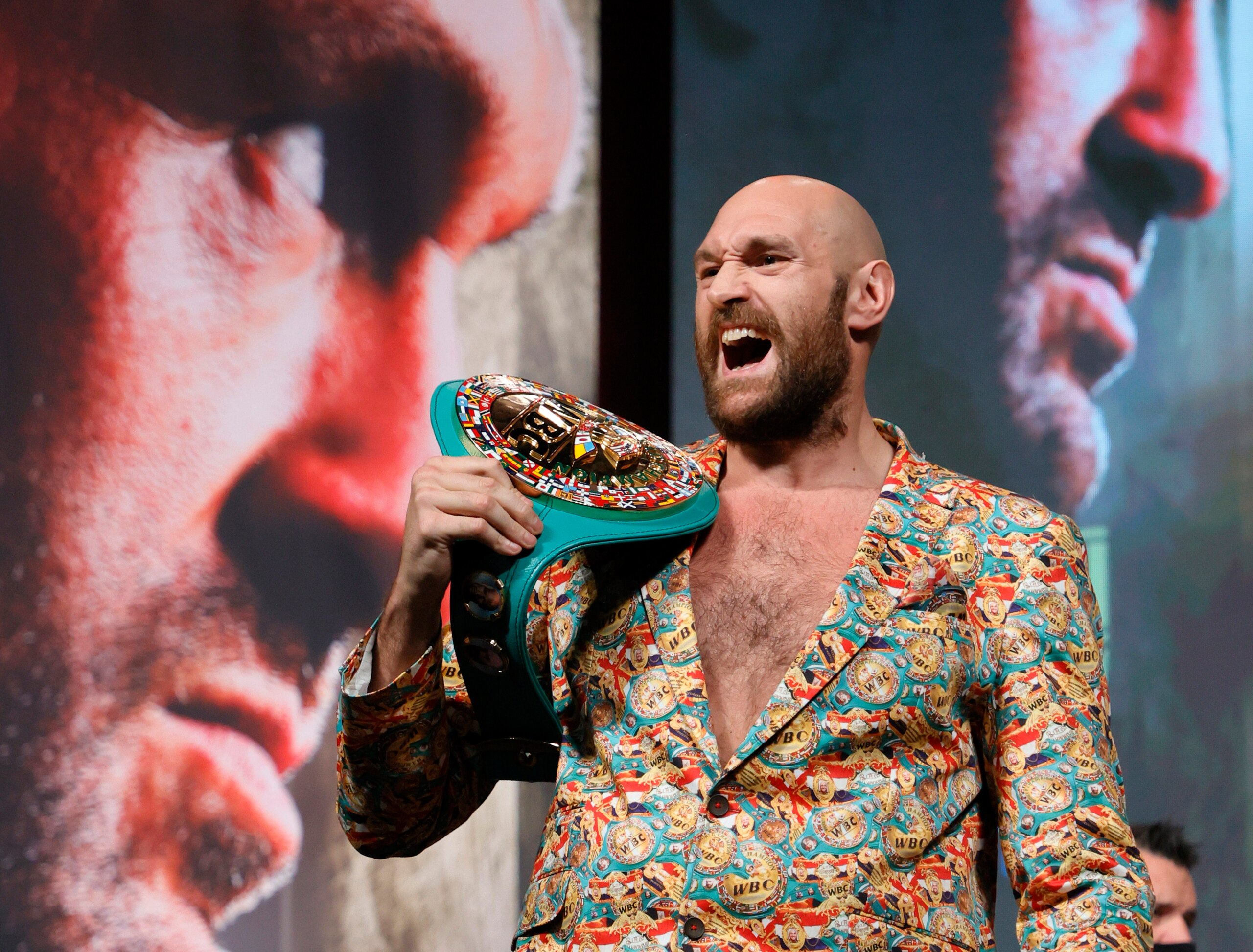 LAS VEGAS, NEVADA - OCTOBER 06:  WBC heavyweight champion Tyson Fury yells during a news conference at MGM Grand Garden Arena on October 6, 2021 in Las Vegas, Nevada. Fury will defend his title against Deontay Wilder on October 9 at T-Mobile Arena in Las Vegas.  (Photo by Ethan Miller/Getty Images)