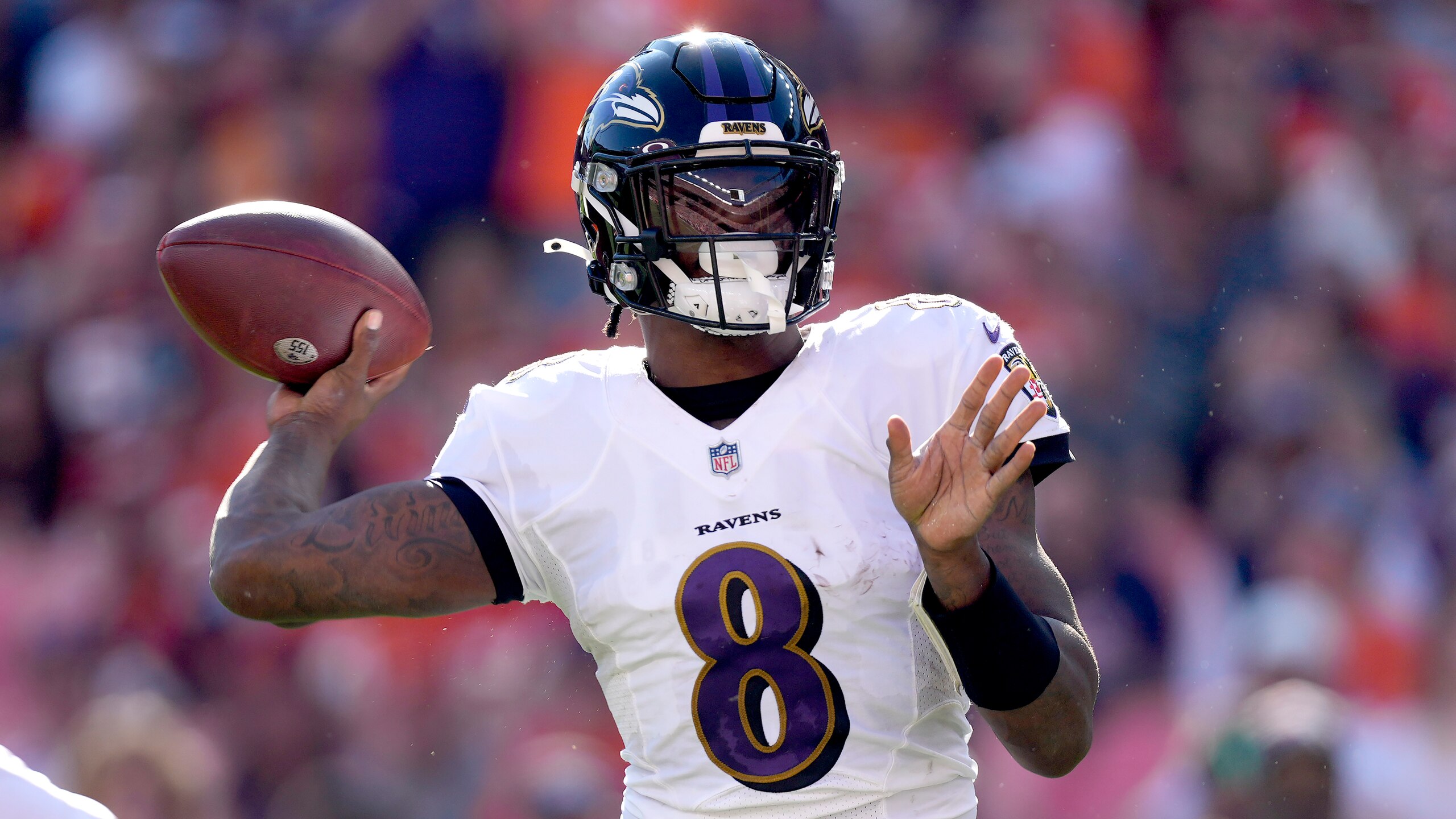 Baltimore Ravens quarterback Lamar Jackson (8) throws against the Denver Broncos during the first half of an NFL football game, Sunday, Oct. 3, 2021, in Denver. (AP Photo/David Zalubowski)