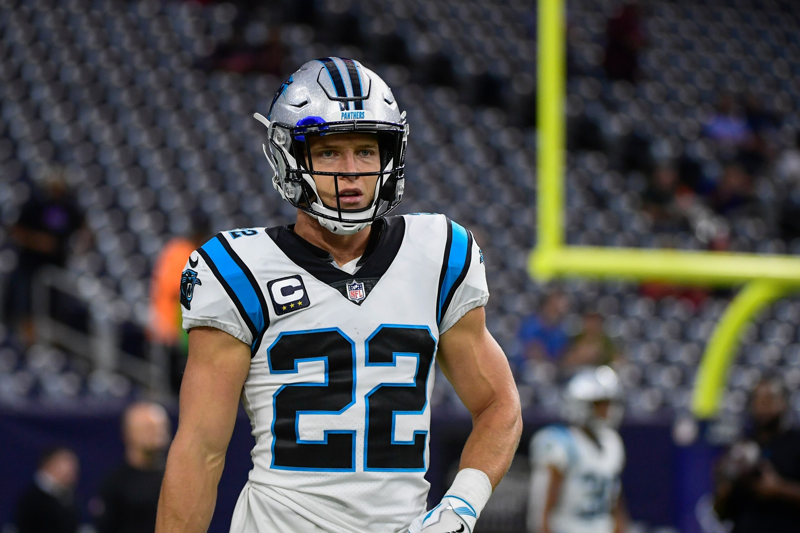 Carolina Panthers running back Christian McCaffrey (22) warms up before an NFL football game against the Houston Texans Thursday, Sept. 23, 2021, in Houston. (AP Photo/Justin Rex)