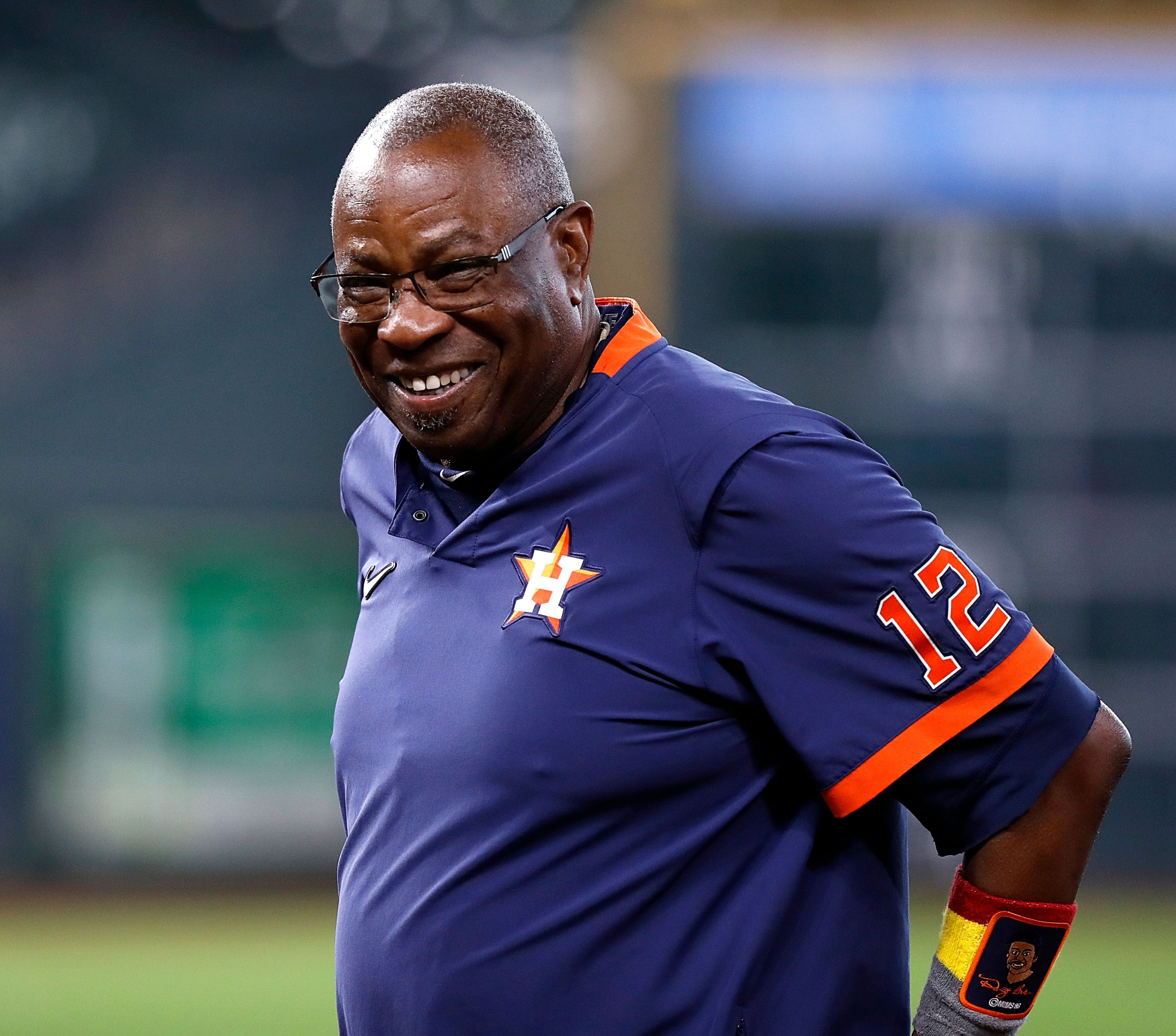 HOUSTON, TEXAS - OCTOBER 01: Manager Dusty Baker Jr. #12 of the Houston Astros before a game against the Oakland Athletics at Minute Maid Park on October 01, 2021 in Houston, Texas. (Photo by Bob Levey/Getty Images)
