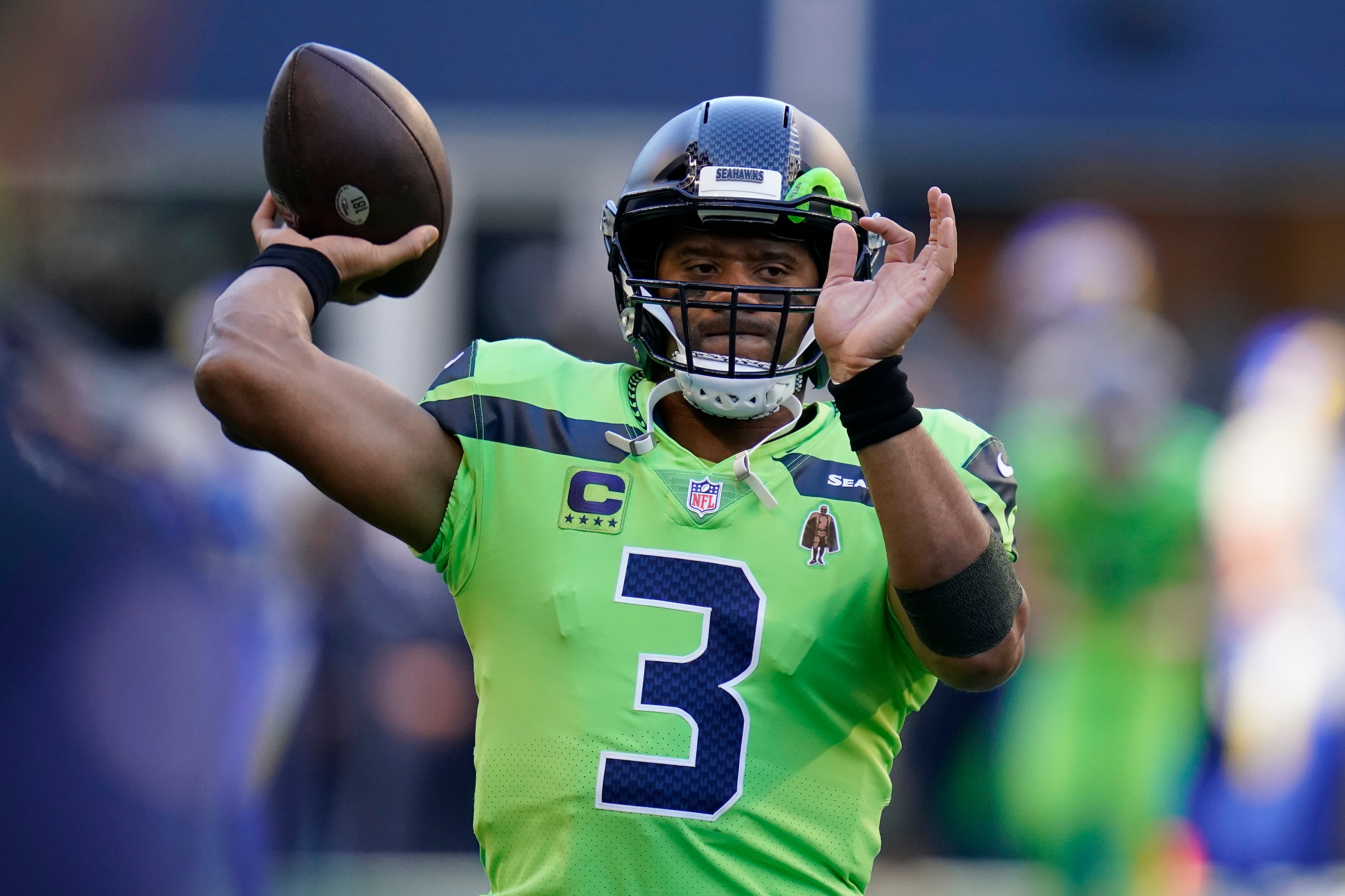 Seattle Seahawks quarterback Russell Wilson passes during warmups before an NFL football game against the Los Angeles Rams, Thursday, Oct. 7, 2021, in Seattle. (AP Photo/Elaine Thompson) Seattle Seahawks quarterback Russell Wilson passes during warmups before an NFL football game against the Los Angeles Rams, Thursday, Oct. 7, 2021, in Seattle. (AP Photo/Elaine Thompson)