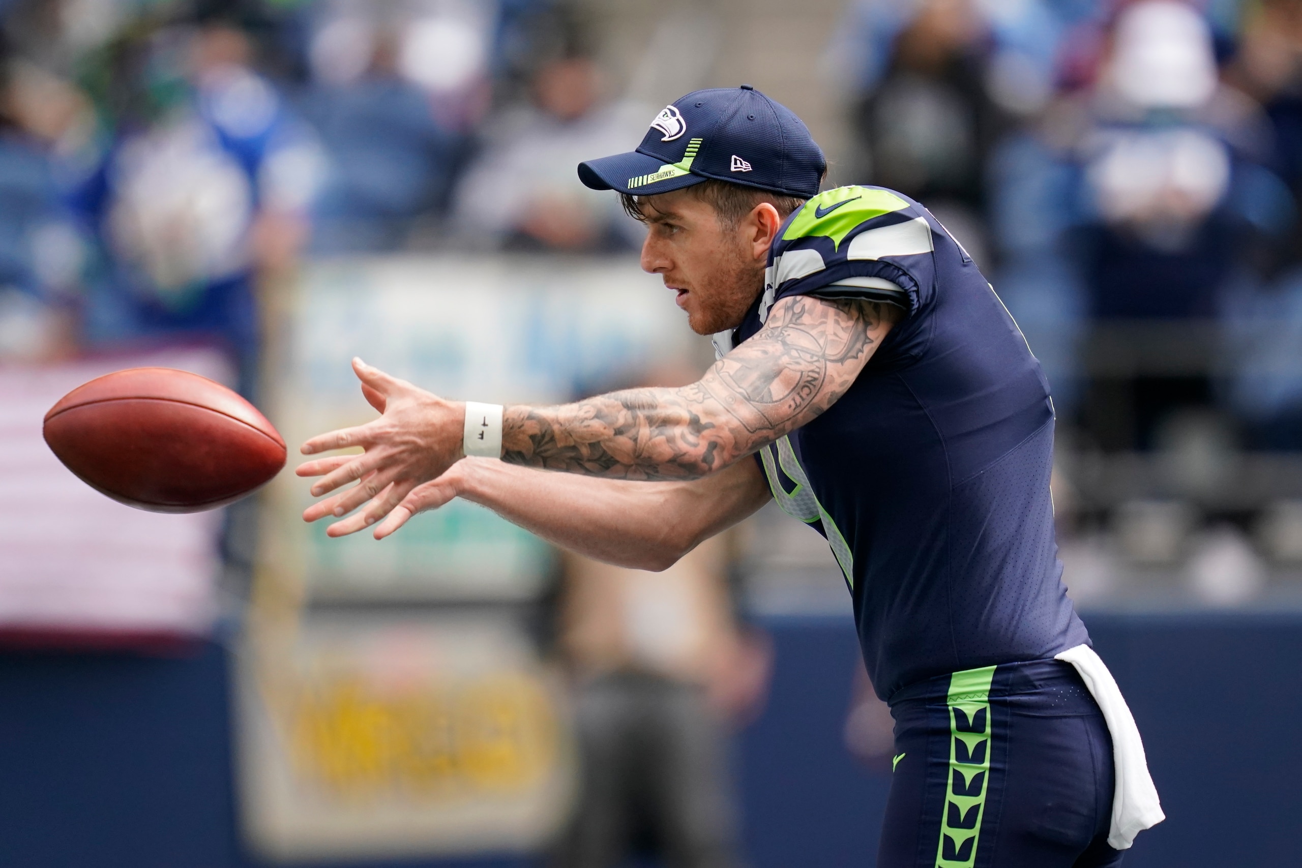 Seattle Seahawks punter Michael Dickson warms up before an NFL football game against the Tennessee Titans, Sunday, Sept. 19, 2021, in Seattle. (AP Photo/Elaine Thompson)