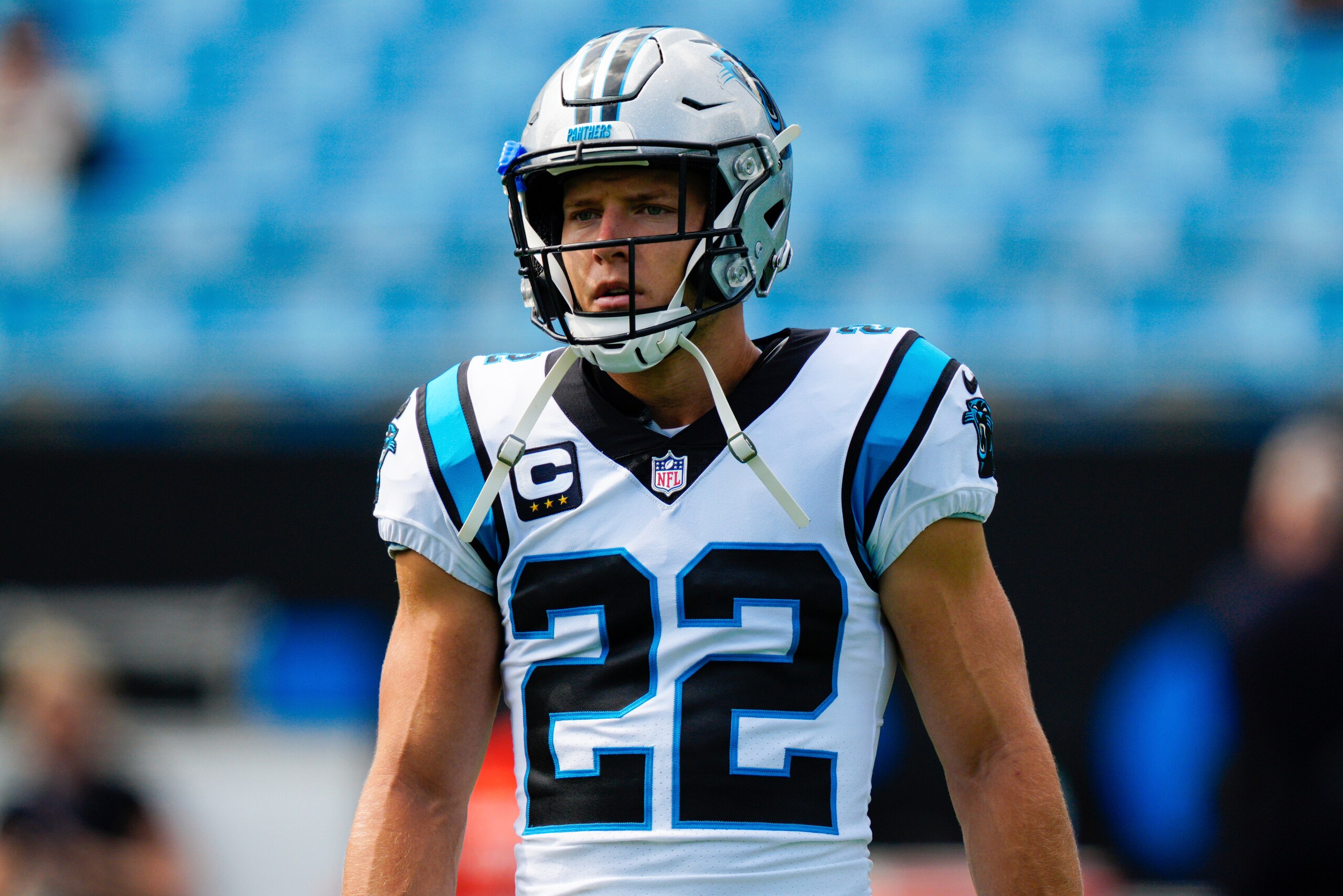 Carolina Panthers running back Christian McCaffrey warms up before an NFL football game against the New Orleans Saints Sunday, Sept. 19, 2021, in Charlotte, N.C. (AP Photo/Jacob Kupferman)