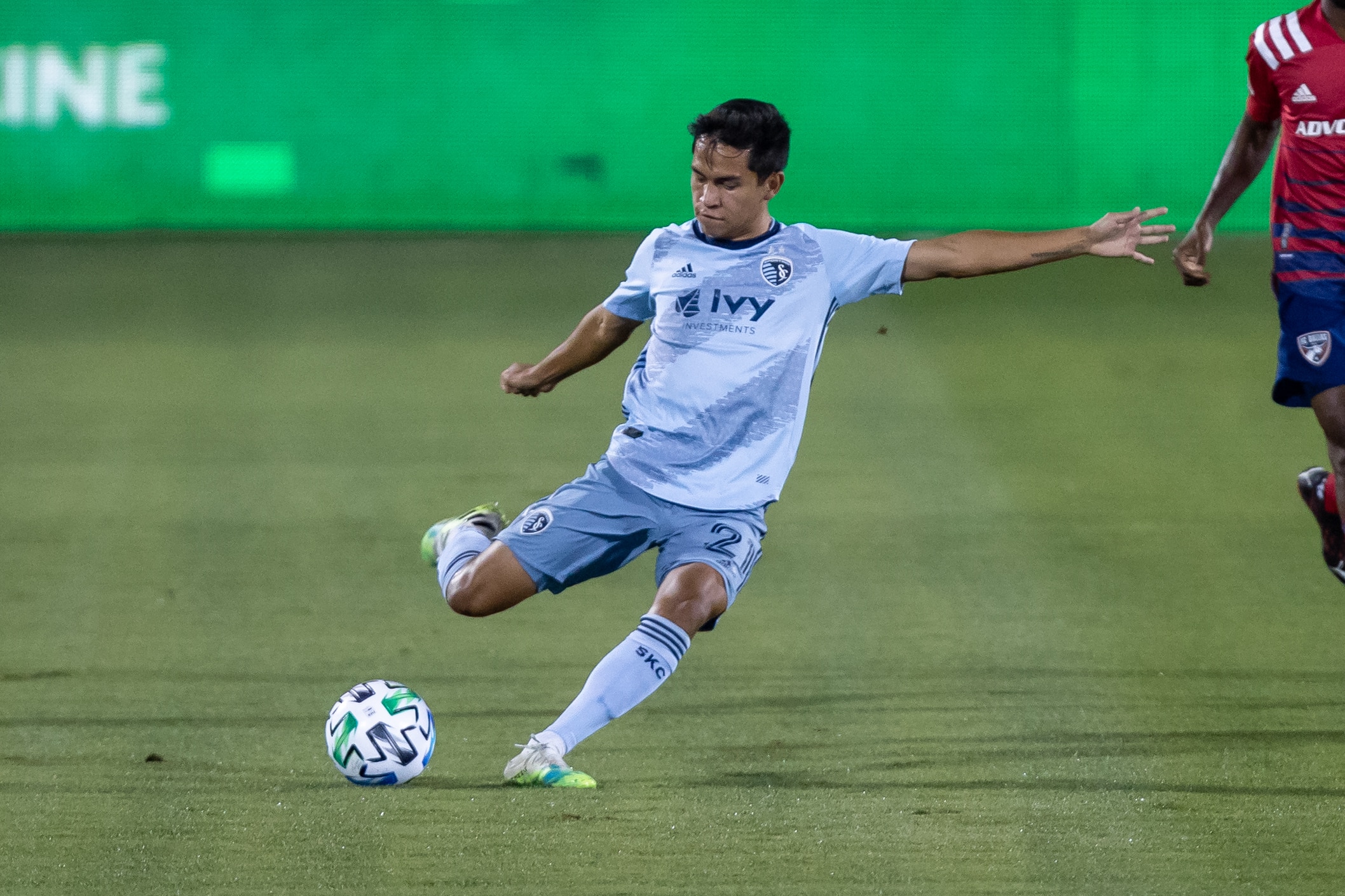 FRISCO, TX - OCTOBER 14: Sporting Kansas City midfielder Felipe Hernandez (#21) kicks the ball during the game between FC Dallas and Sporting Kansas City on October 14, 2020 at Toyota Stadium in Frisco, TX. (Photo by  Matthew Visinsky/Icon Sportswire via Getty Images)
