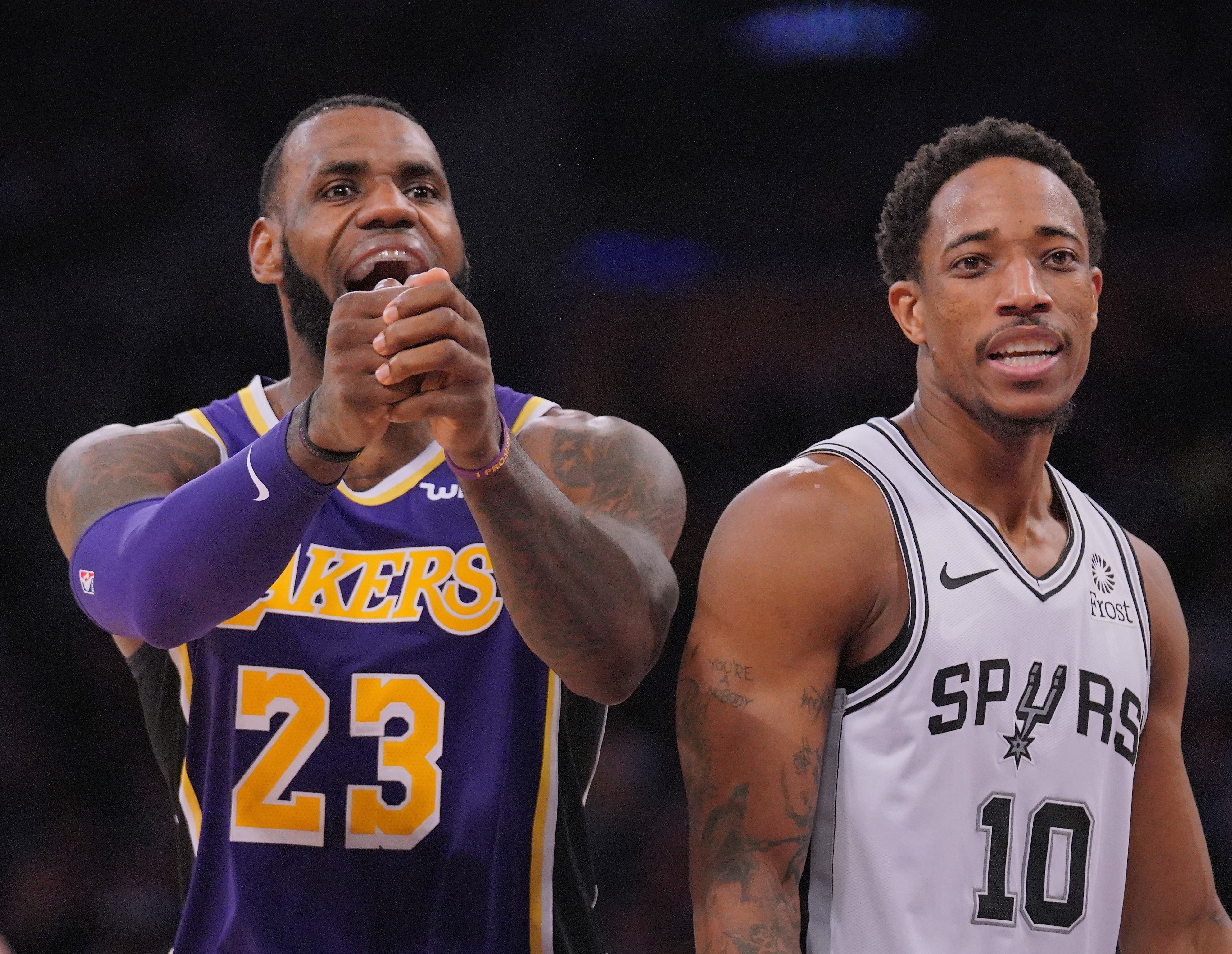 LOS ANGELES, CA - DECEMBER 05:  LeBron James #23 of the Los Angeles Lakers and DeMar DeRozan #10 of the San Antonio Spurs react to a call during a 121-113 Laker win at Staples Center on December 5, 2018 in Los Angeles, California.  NOTE TO USER: User expressly acknowledges and agrees that, by downloading and or using this photograph, User is consenting to the terms and conditions of the Getty Images License Agreement.  (Photo by Harry How/Getty Images)