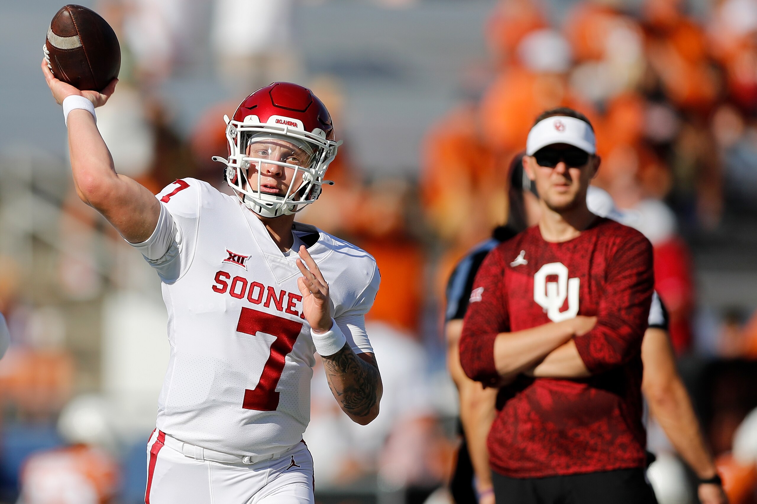 DALLAS, TEXAS - OCTOBER 09: Spencer Rattler #7 of the Oklahoma Sooners warms up before the game against the Texas Longhorns during the 2021 AT&T Red River Showdown at Cotton Bowl on October 09, 2021 in Dallas, Texas. (Photo by Tim Warner/Getty Images)