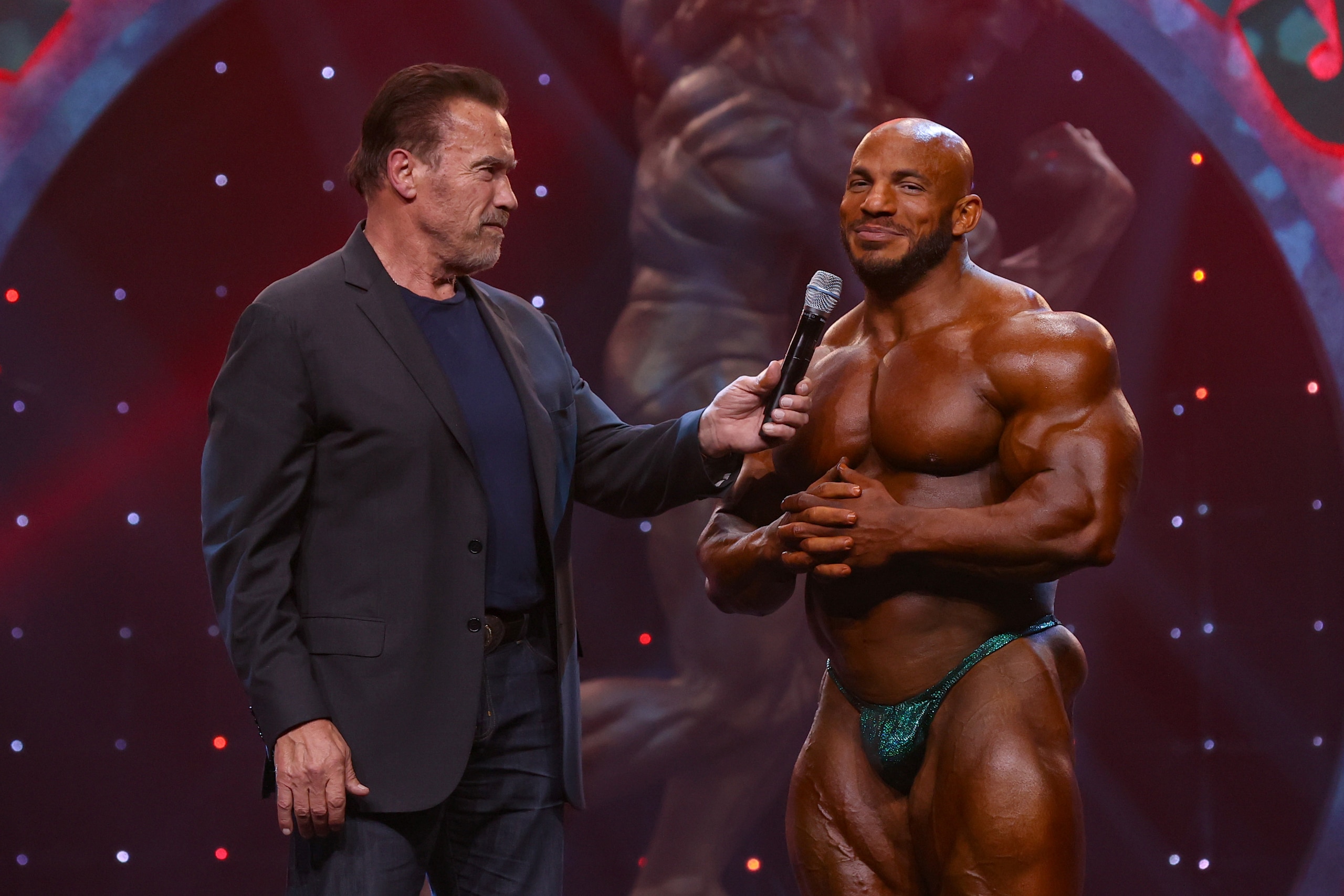 COLUMBUS, OH - MARCH 07: Arnold Schwarzenegger interviews Mamdouh "Big Ramy" Elssbiay (9) after Elssbiay won the inaugural Franco Columbu Most Muscular Award during the Arnold Classic as part of the Arnold Sports Festival on March 7, 2020, at the Greater Columbus Convention Center in Columbus, OH. (Photo by Frank Jansky/Icon Sportswire via Getty Images)
