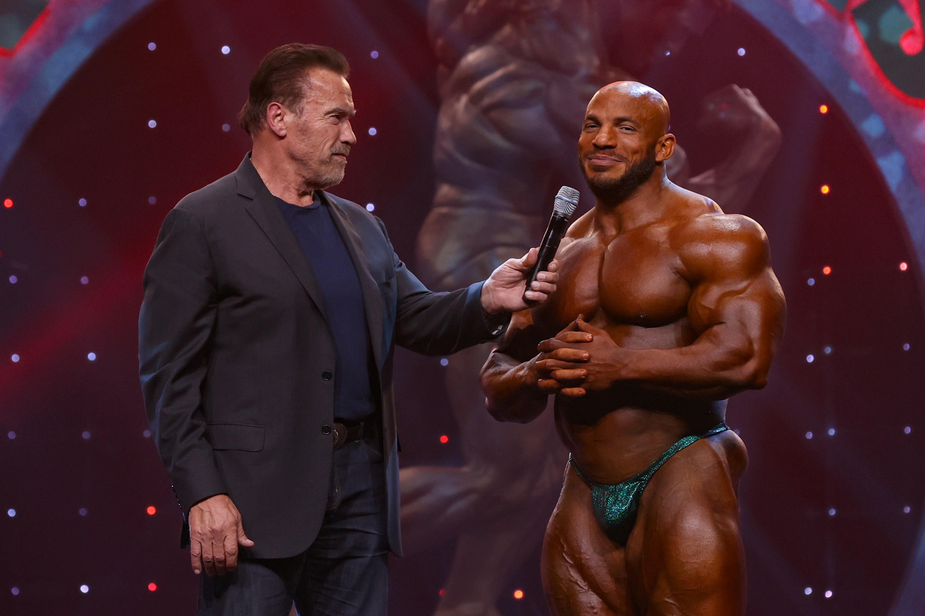 COLUMBUS, OH - MARCH 07: Arnold Schwarzenegger interviews Mamdouh "Big Ramy" Elssbiay (9) after Elssbiay won the inaugural Franco Columbu Most Muscular Award during the Arnold Classic as part of the Arnold Sports Festival on March 7, 2020, at the Greater Columbus Convention Center in Columbus, OH. (Photo by Frank Jansky/Icon Sportswire via Getty Images)