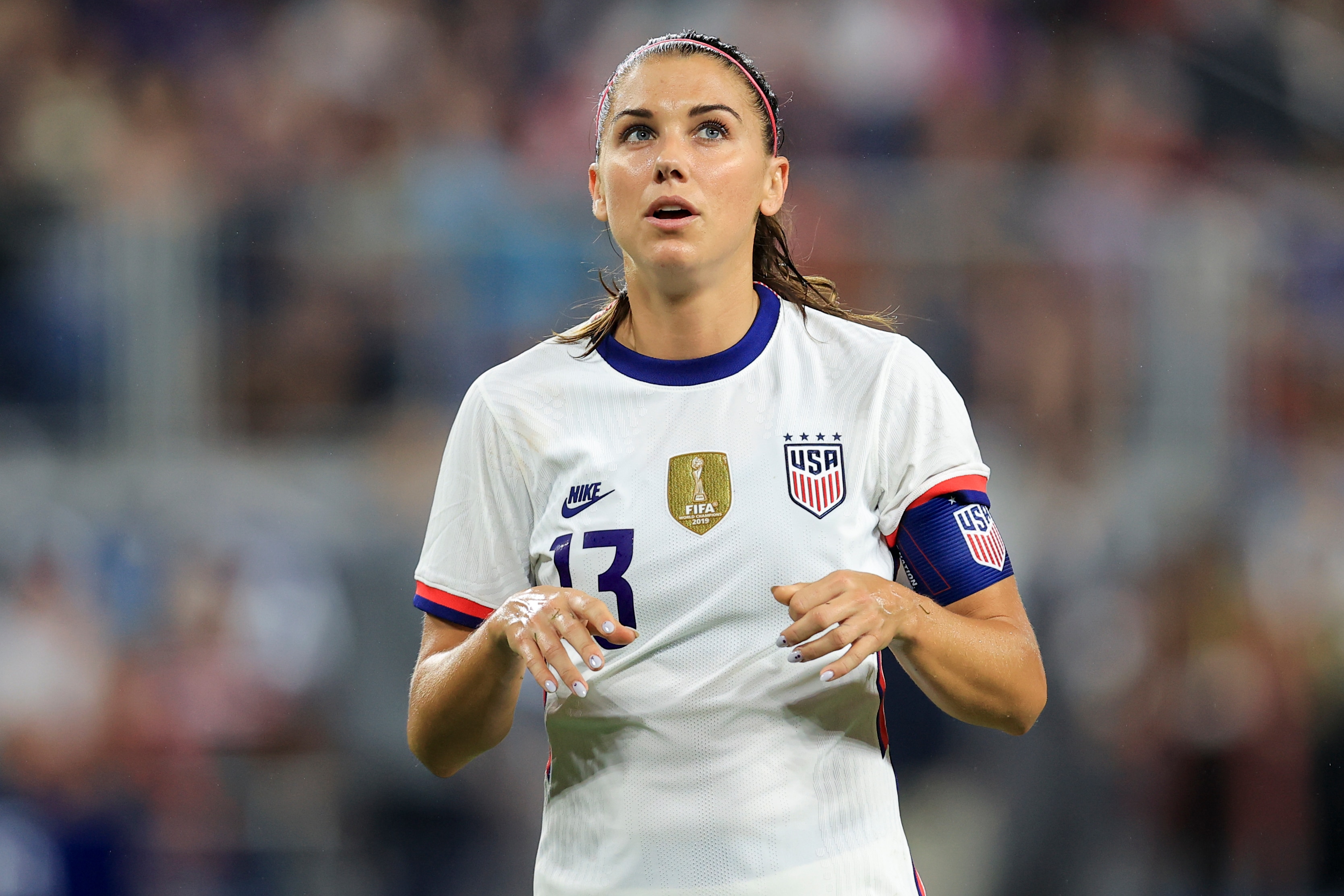 United States forward Alex Morgan (13) plays the field during an international friendly soccer match against Paraguay, Tuesday, Sept. 21, 2021, in Cincinnati. The United States won 8-0. (AP Photo/Aaron Doster)