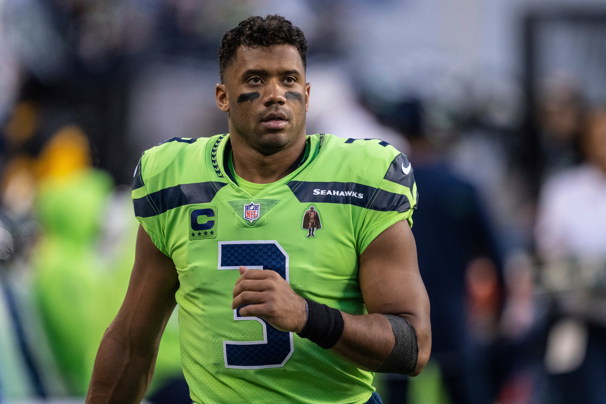Seattle Seahawks quarterback Russell Wilson is pictured on the sidelines during the first half of an NFL football game against the Los Angeles Rams, Thursday, Oct. 7, 2021, in Seattle. The Rams won 26-17. (AP Photo/Stephen Brashear)