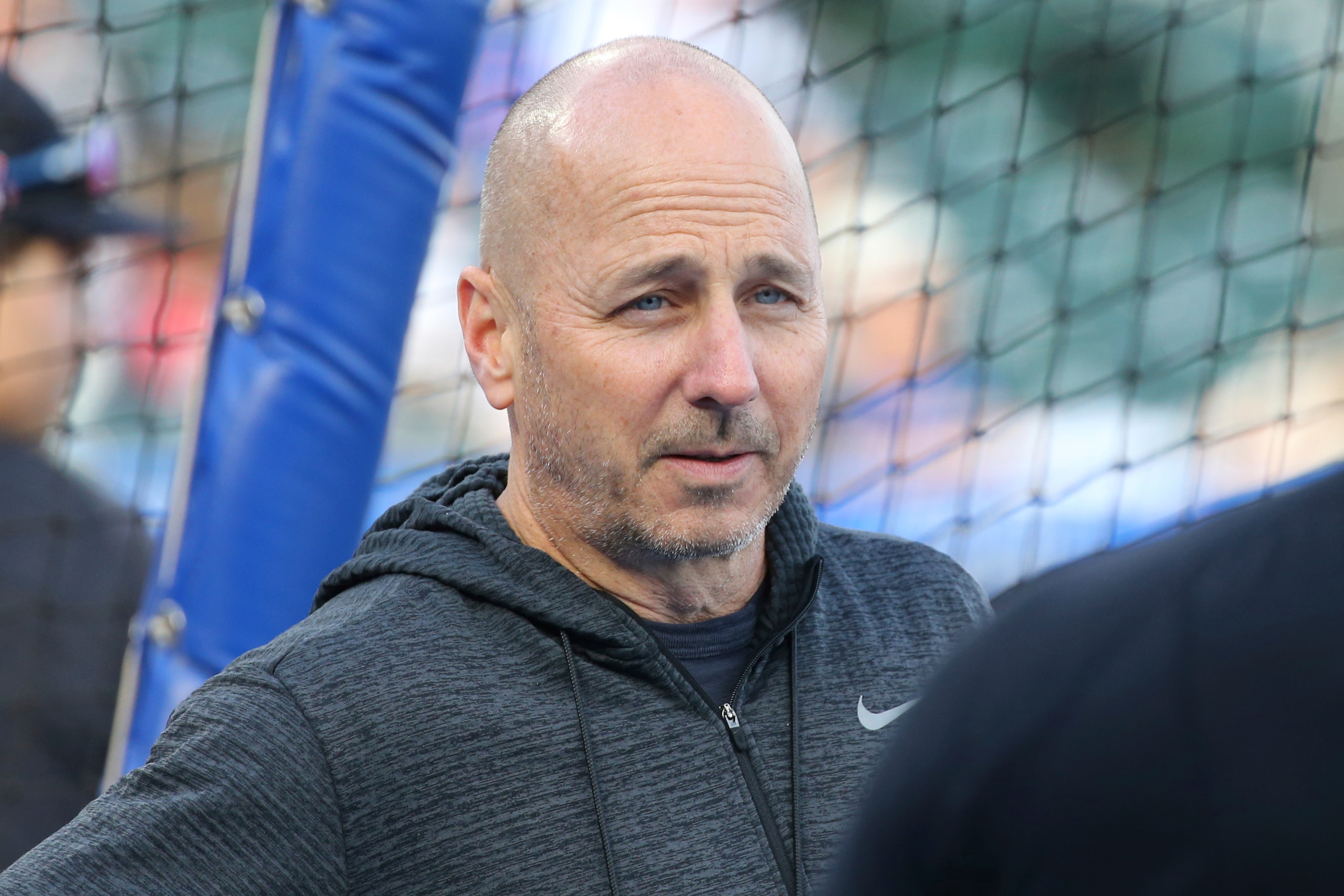 New York Yankees general manager Brian Cashman looks on during batting practice prior to the first inning of a baseball game against the Toronto Blue Jays, Wednesday, June 16, 2021, in Buffalo, N.Y. (AP Photo/Jeffrey T. Barnes)