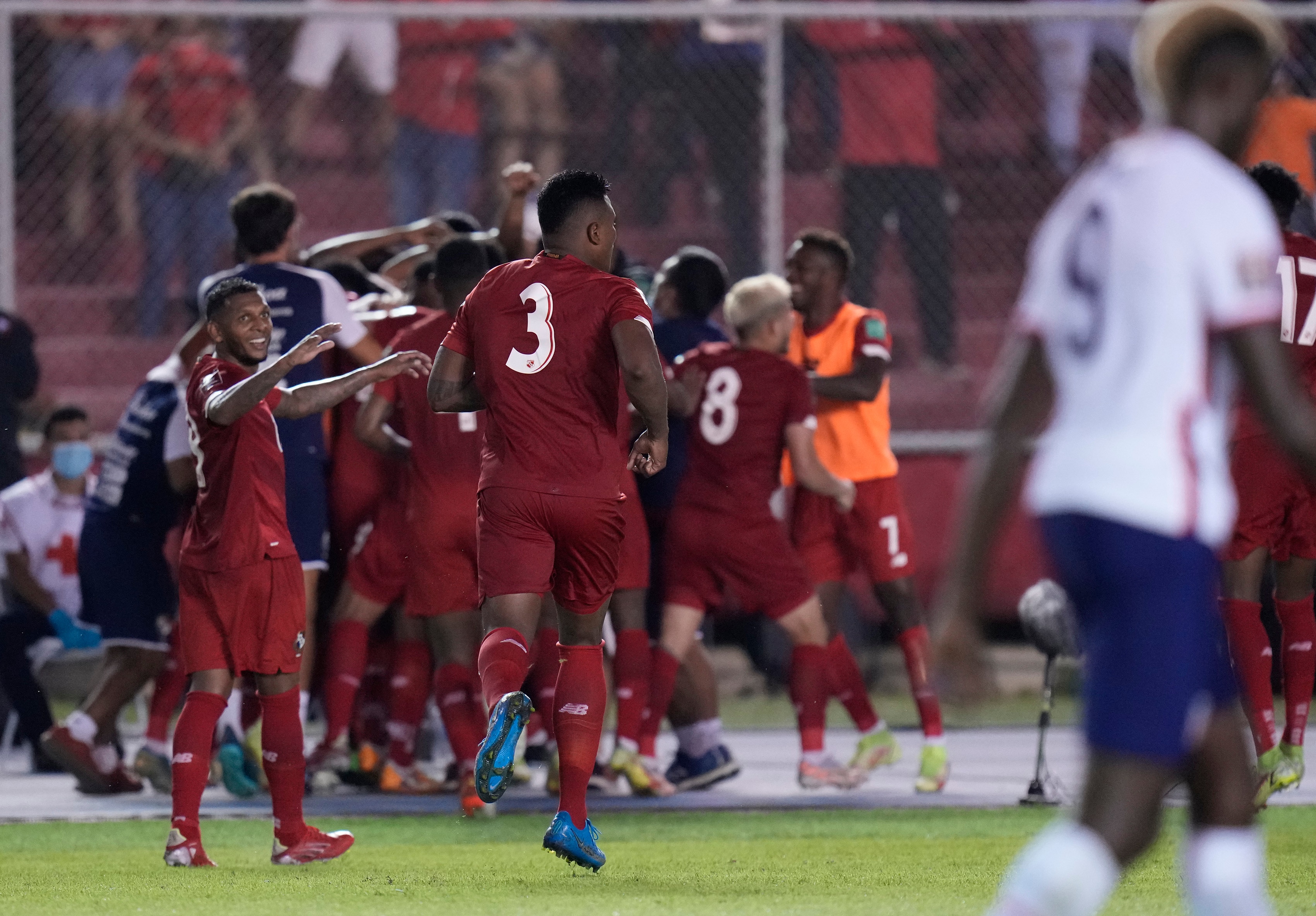 Panama's Anibal Godoy celebrates with teammates after scoring his side's opening goal against United States during a qualifying soccer match for the FIFA World Cup Qatar 2022 at Rommel Fernandez stadium, Panama city, Panama, Sunday, Oct. 10, 2021. (AP Photo/Arnulfo Franco)