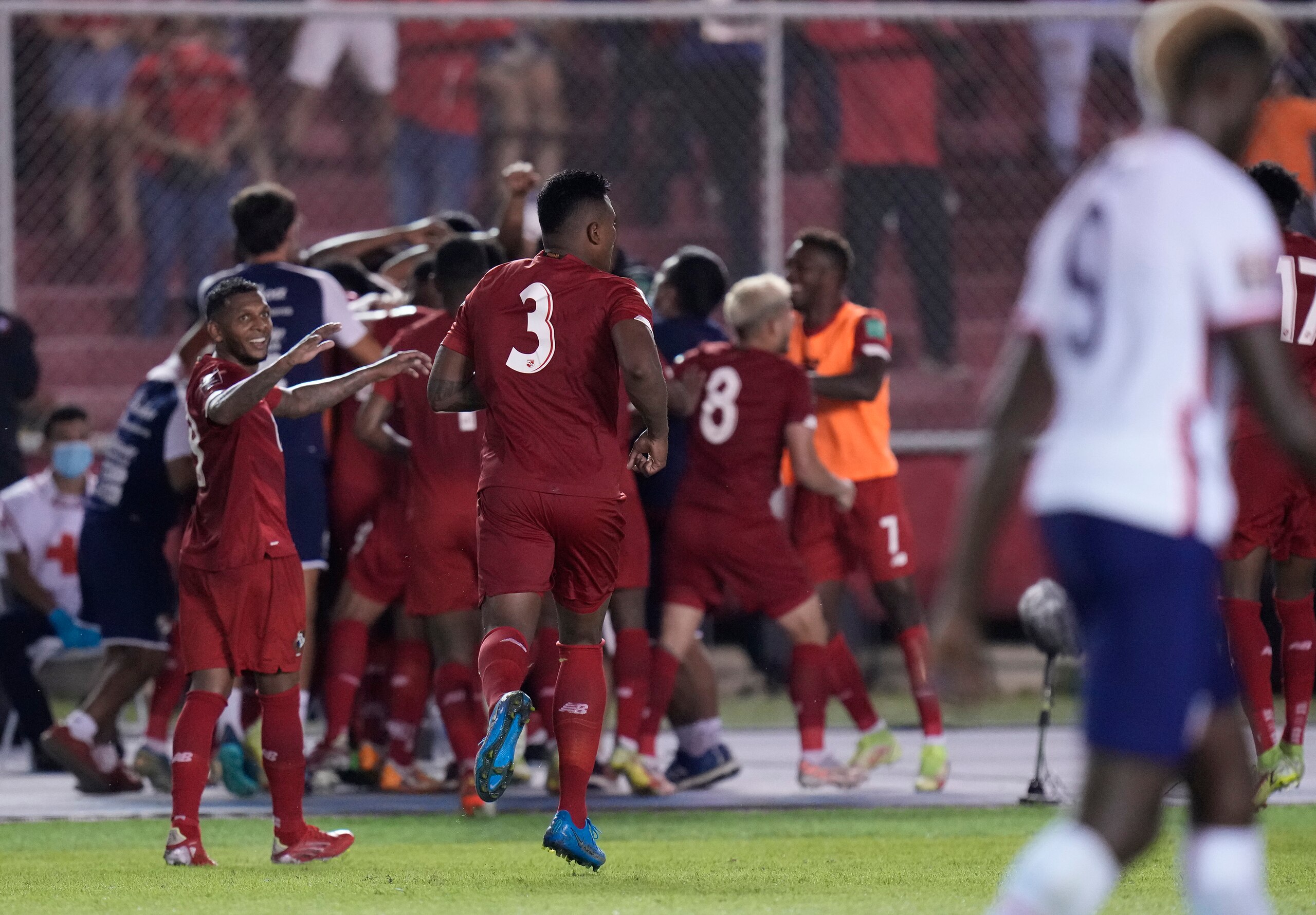 Panama's Anibal Godoy celebrates with teammates after scoring his side's opening goal against United States during a qualifying soccer match for the FIFA World Cup Qatar 2022 at Rommel Fernandez stadium, Panama city, Panama, Sunday, Oct. 10, 2021. (AP Photo/Arnulfo Franco)