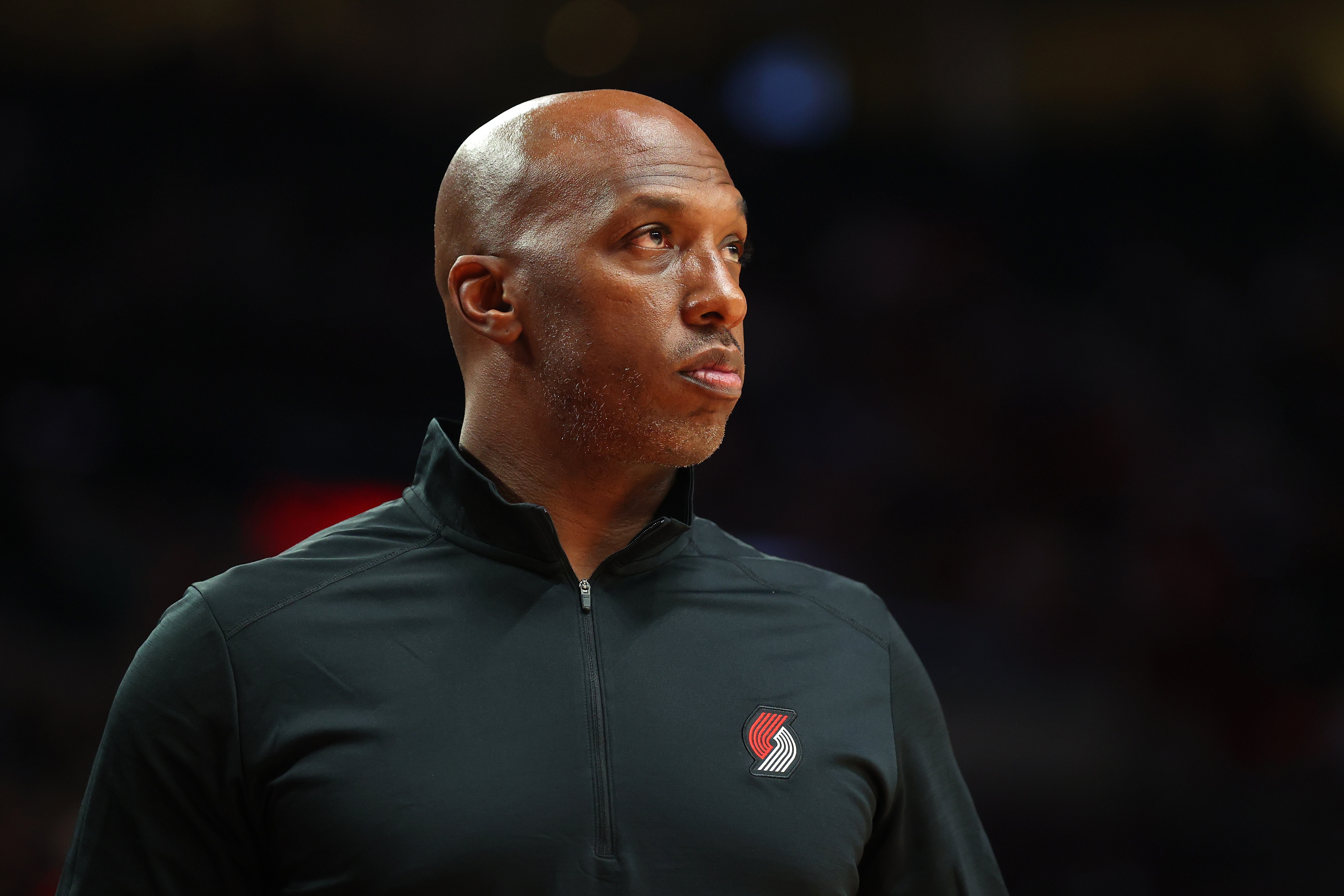 PORTLAND, OREGON - OCTOBER 04: Head Coach Chauncey Billups of the Portland Trail Blazers looks on against the Golden State Warriors the second quarter during the preseason game at Moda Center on October 04, 2021 in Portland, Oregon. NOTE TO USER: User expressly acknowledges and agrees that, by downloading and or using this photograph, User is consenting to the terms and conditions of the Getty Images License Agreement.  (Photo by Abbie Parr/Getty Images)