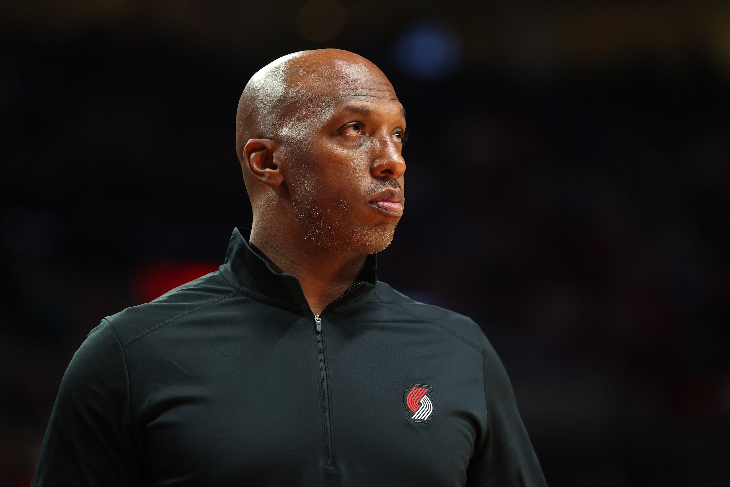 PORTLAND, OREGON - OCTOBER 04: Head Coach Chauncey Billups of the Portland Trail Blazers looks on against the Golden State Warriors the second quarter during the preseason game at Moda Center on October 04, 2021 in Portland, Oregon. NOTE TO USER: User expressly acknowledges and agrees that, by downloading and or using this photograph, User is consenting to the terms and conditions of the Getty Images License Agreement.  (Photo by Abbie Parr/Getty Images)