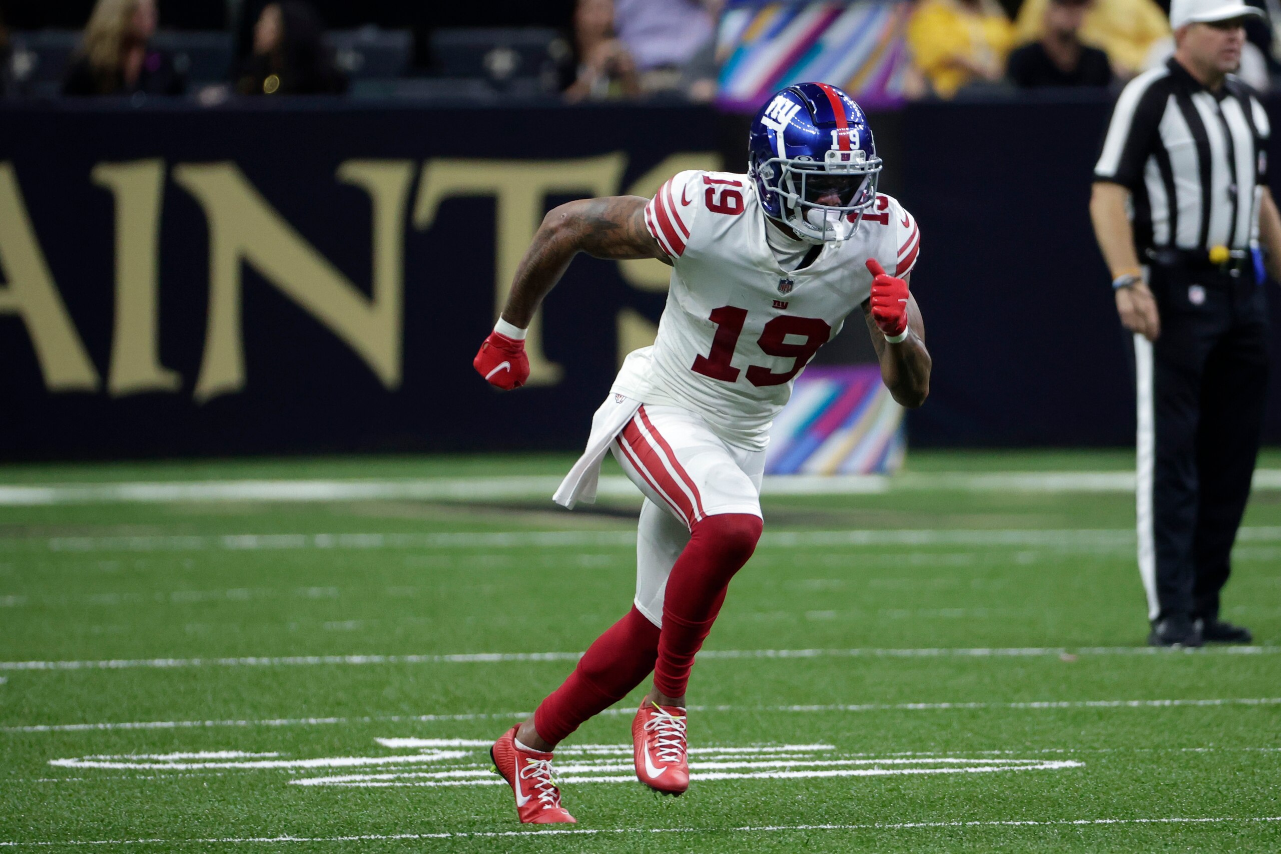 New York Giants wide receiver Kenny Golladay (19) runs off the line in the second half of an NFL football game against the New Orleans Saints in New Orleans, Sunday, Oct. 3, 2021. (AP Photo/Derick Hingle)