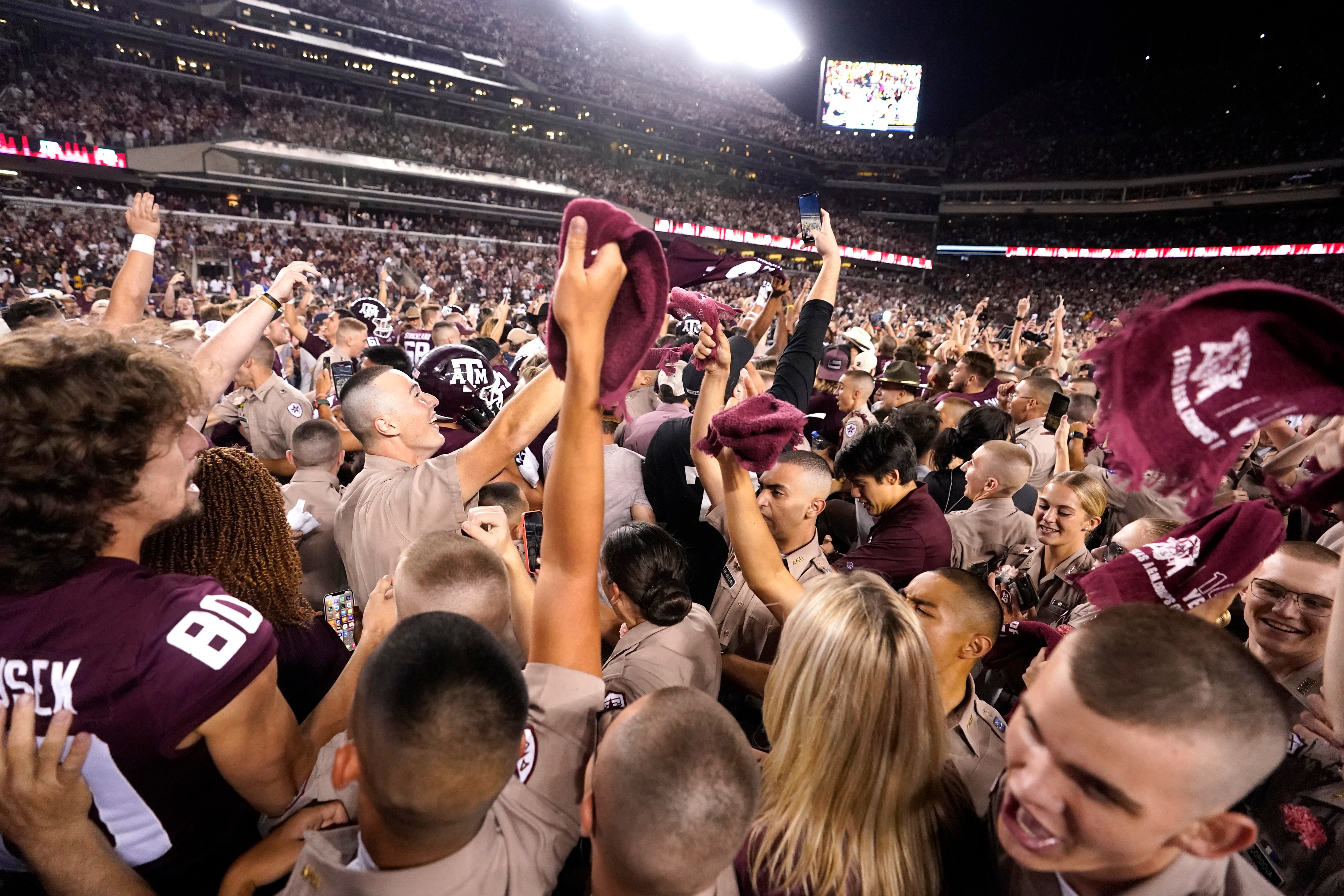 Texas A&M students pack Kyle Field after Texas A&M upset Alabama 38-41 in an NCAA college football game on Saturday, Oct. 9, 2021, in College Station, Texas. (AP Photo/Sam Craft)