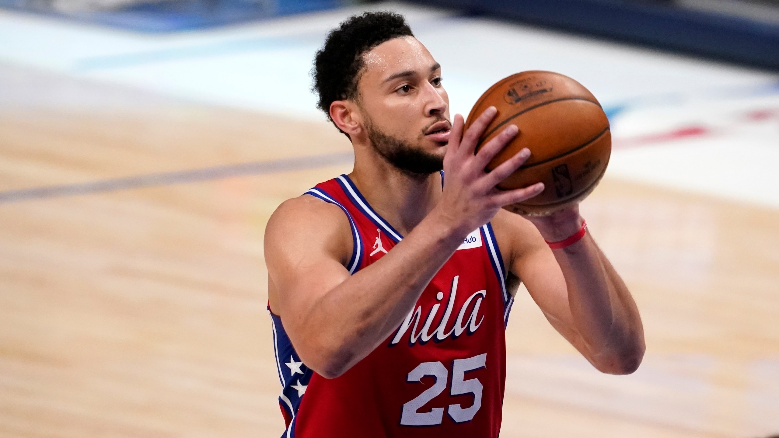 FILE - Philadelphia 76ers' Ben Simmons shoots free throws during an NBA basketball game against the Dallas Mavericks in Dallas, in this Monday, April 12, 2021, file photo. Ben Simmons can't shoot and lost his confidence. He blamed a mental block on the worst free-throw shooting percentage in NBA playoff history. The 76ers head into the offseason faced with a big question - do they try and salvage Simmons or deal the former No. 1 pick. . (AP Photo/Tony Gutierrez)