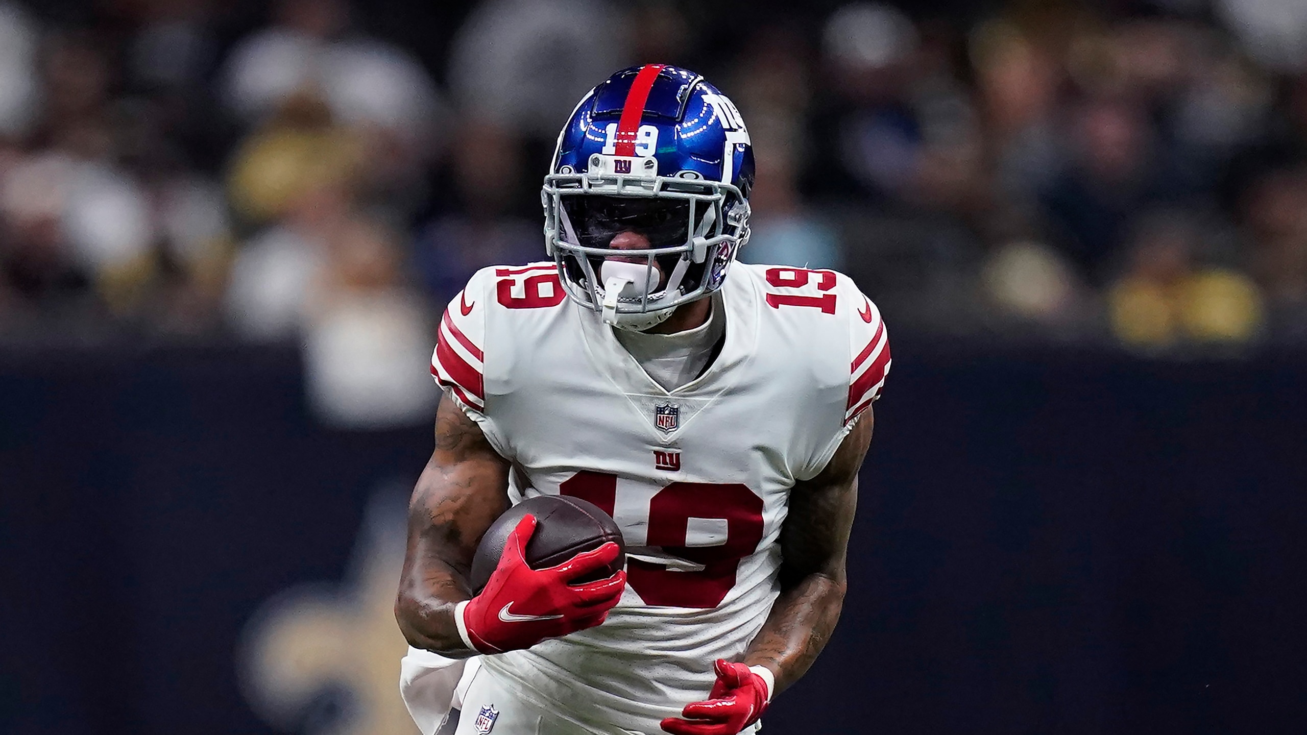New York Giants wide receiver Kenny Golladay (19) carries in the first half of an NFL football game against the New Orleans Saints in New Orleans, Sunday, Oct. 3, 2021. (AP Photo/Brett Duke)