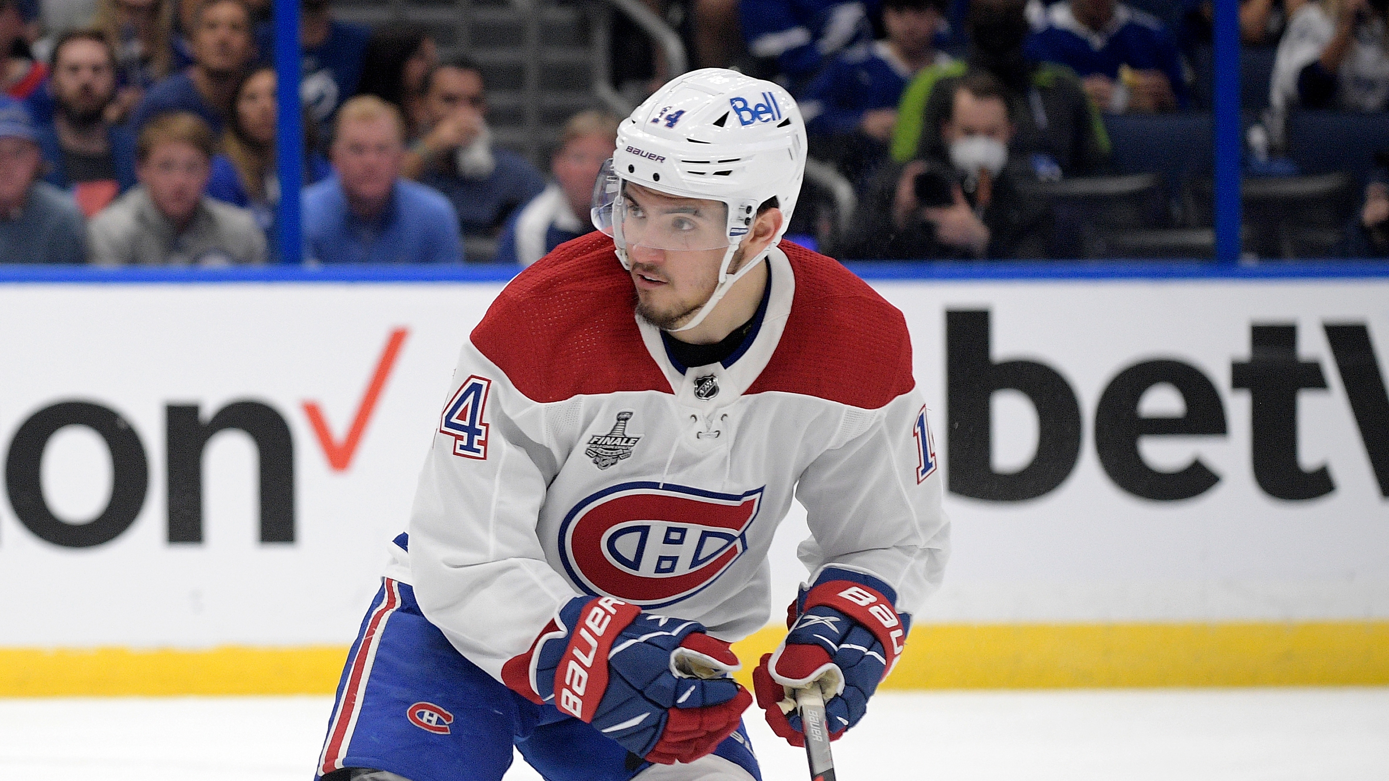 Montreal Canadiens center Nick Suzuki (14) follows a play during the third period of Game 1 of the NHL hockey Stanley Cup finals series against the Tampa Bay Lightning, Monday, June 28, 2021, in Tampa, Fla. (AP Photo/Phelan M. Ebenhack)
