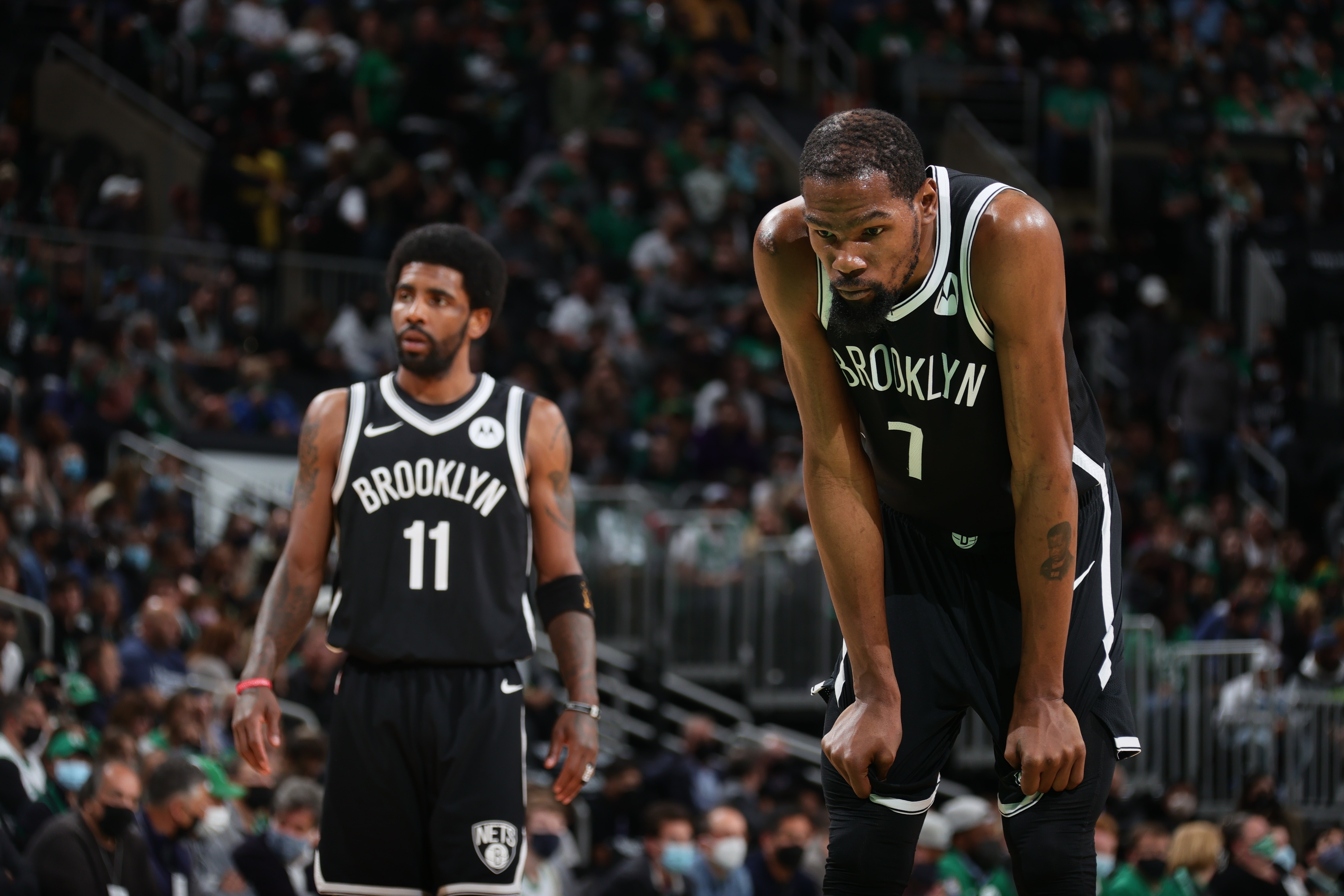 BOSTON, MA - MAY 30: Kevin Durant #7 of the Brooklyn Nets and Kyrie Irving #11 look on during the game against the Boston Celtics during Round 1, Game 4 of the 2021 NBA Playoffs on May 30, 2021 at the TD Garden in Boston, Massachusetts.  NOTE TO USER: User expressly acknowledges and agrees that, by downloading and or using this photograph, User is consenting to the terms and conditions of the Getty Images License Agreement. Mandatory Copyright Notice: Copyright 2021 NBAE  (Photo by Nathaniel S. Butler/NBAE via Getty Images)