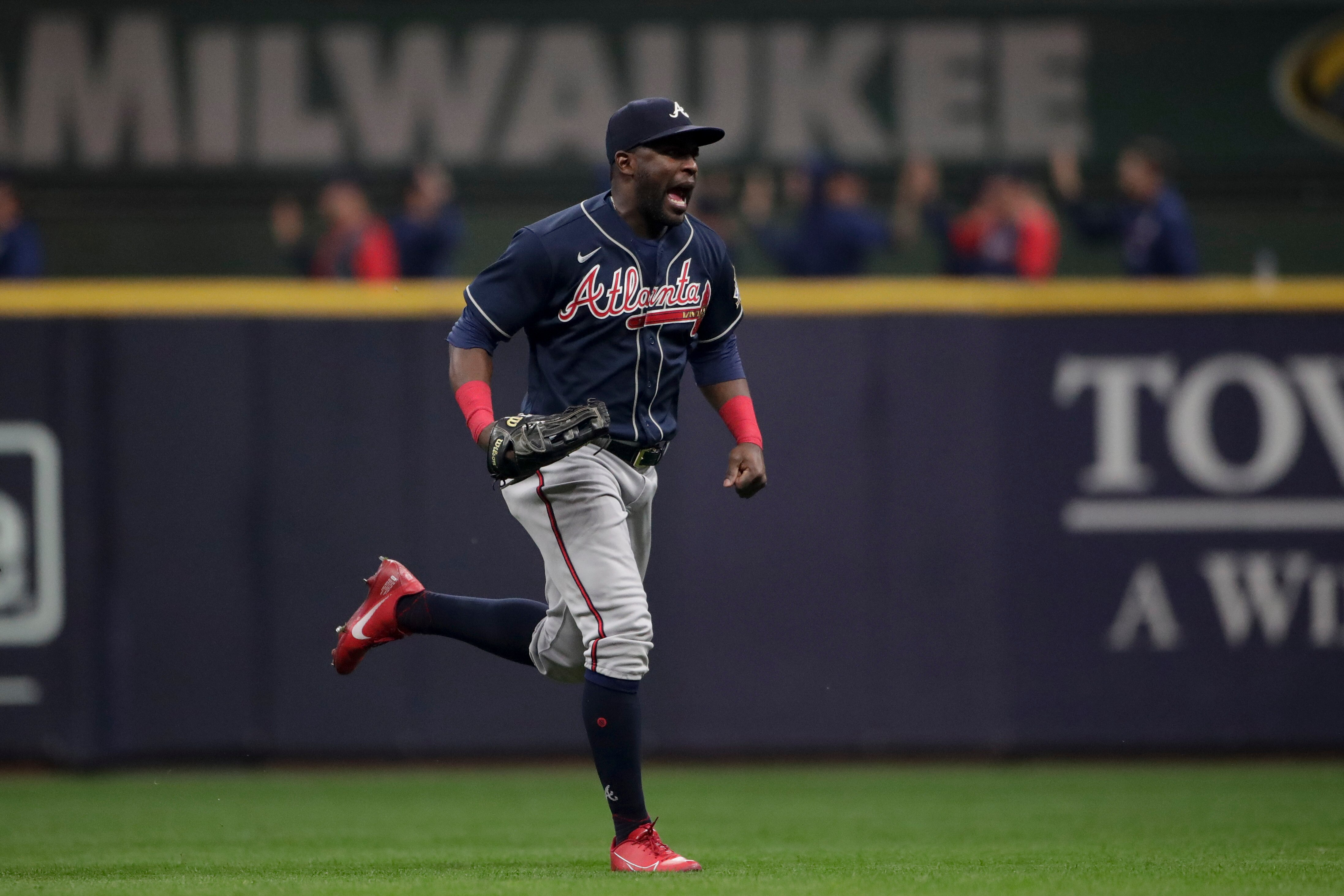Atlanta Braves right fielder Jorge Soler celebrates their win against the Milwaukee Brewers in Game 2 of baseball's National League Divisional Series Saturday, Oct. 9, 2021, in Milwaukee. (AP Photo/Aaron Gash)