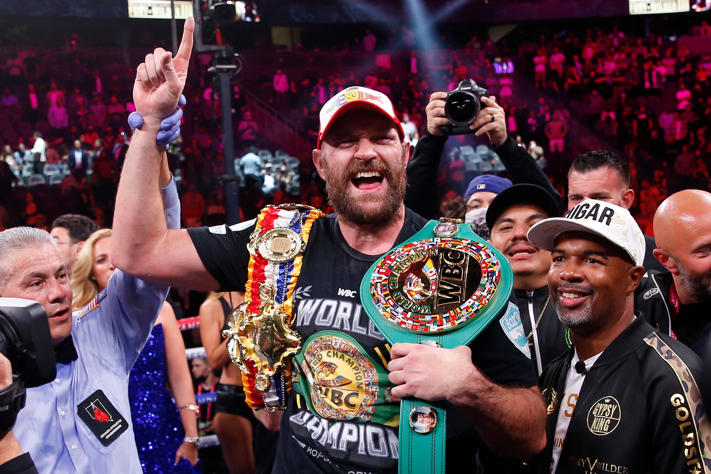 Tyson Fury, of England, celebrates after defeating Deontay Wilder in a heavyweight championship boxing match Saturday, Oct. 9, 2021, in Las Vegas. (AP Photo/Chase Stevens)
