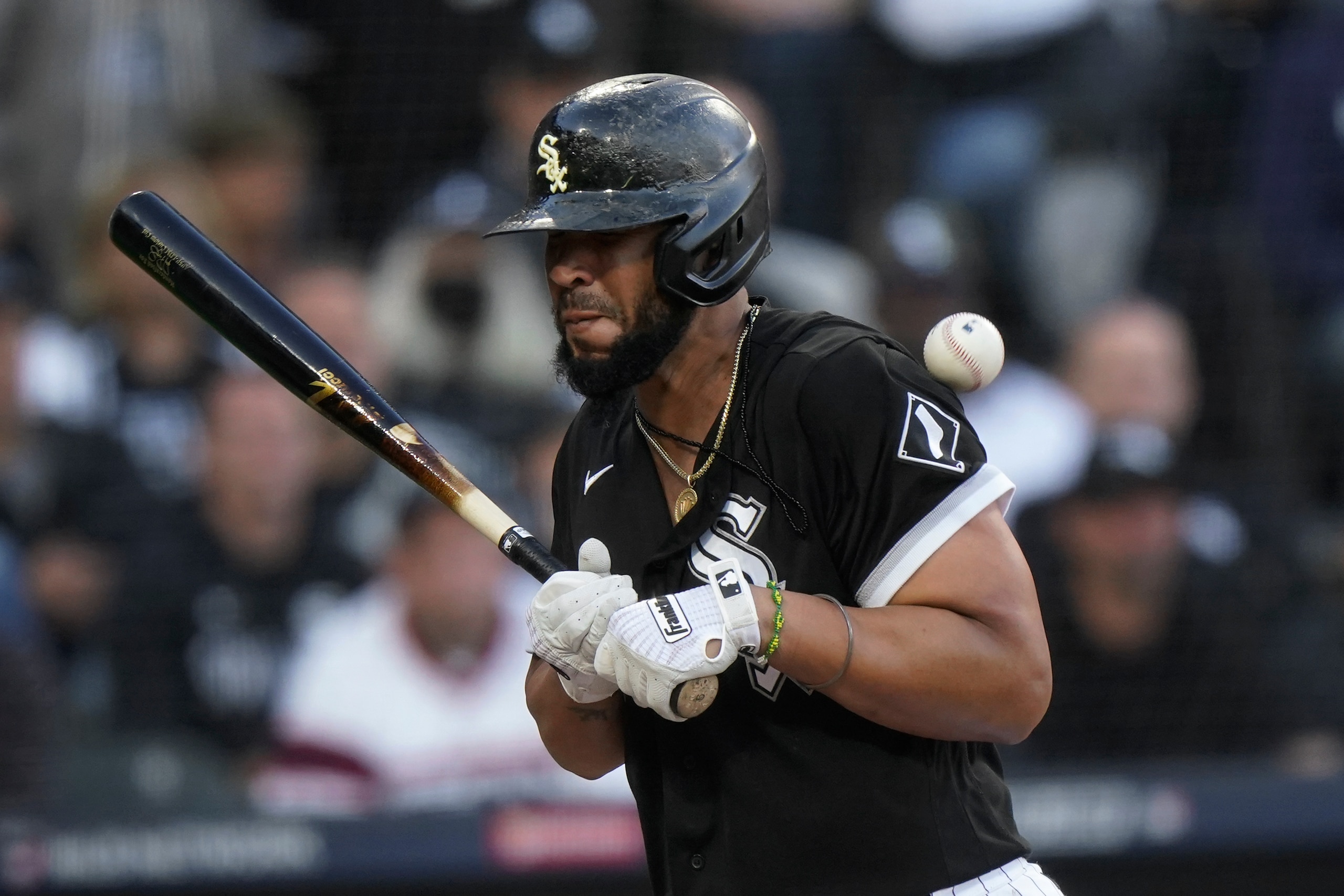 Chicago White Sox first baseman Jose Abreu is hit by a Houston Astros' Kendall Graveman pitch in the eighth inning during Game 4 of a baseball American League Division Series Tuesday, Oct. 12, 2021, in Chicago. (AP Photo/Nam Y. Huh)