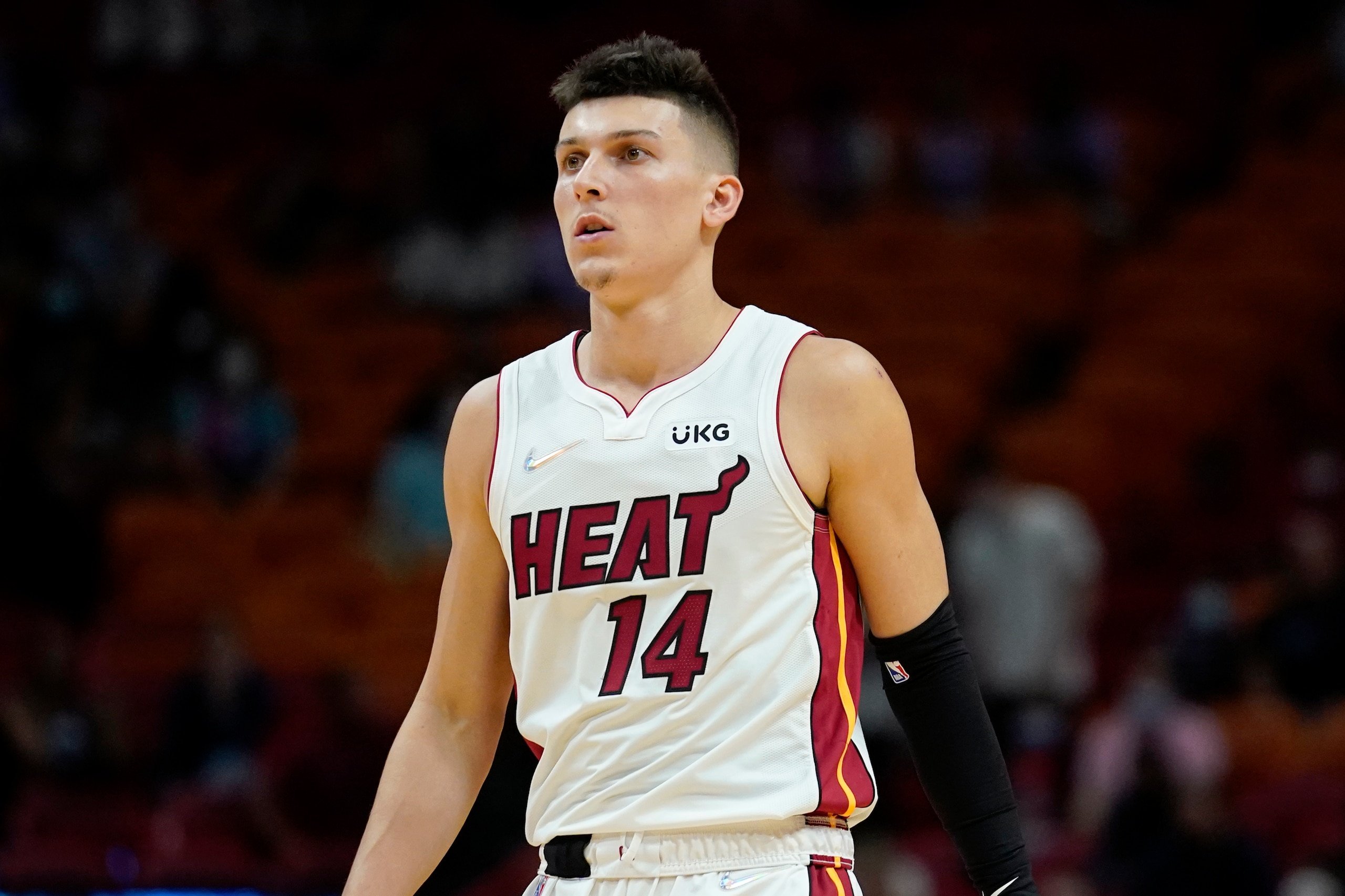 Miami Heat guard Tyler Herro (14) I sin action during the first half of a preseason NBA basketball game against the Charlotte Hornets, Monday, Oct. 11, 2021, in Miami. (AP Photo/Lynne Sladky)